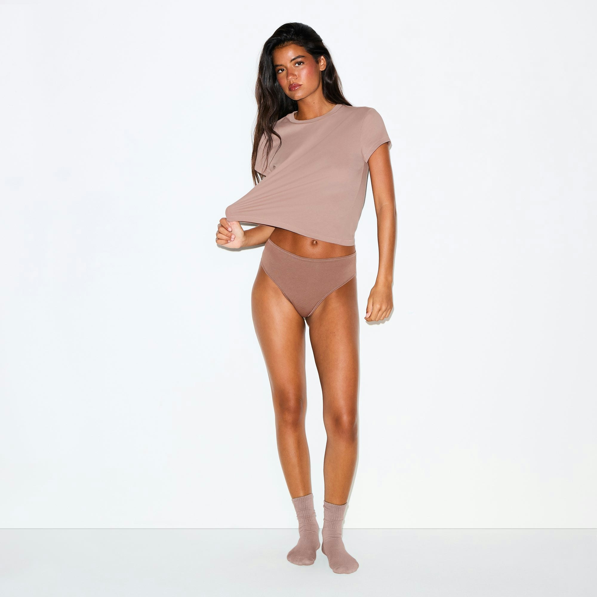 PERIOD PANTIES THONG | UMBER ON A MODEL FRONT VIEW @ | FOCUS: 0.0, 1.0, 0.9