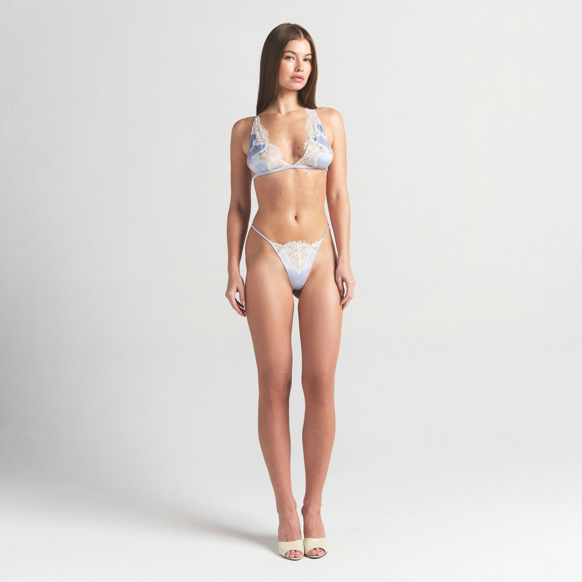 SILK LACE STRING THONG | PERIWINKLE CONTRAST ON A MODEL FRONT VIEW @ | FOCUS: 0.0, 1.0, 0.9