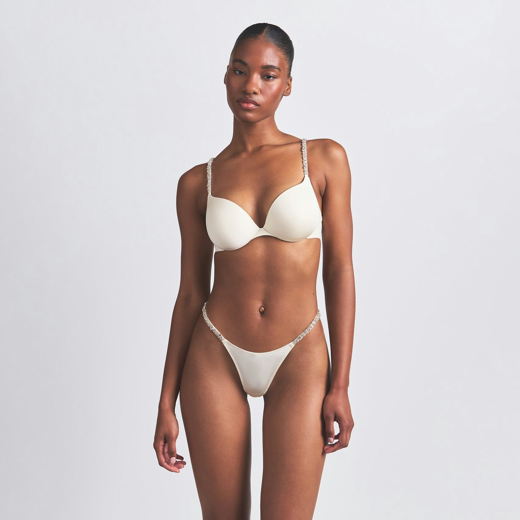 SHINE FOUNDATIONS RHINESTONE STRAP STRING THONG | ECRU ON A MODEL FRONT VIEW @ | FOCUS: 0.0, 1.0, 0.9
