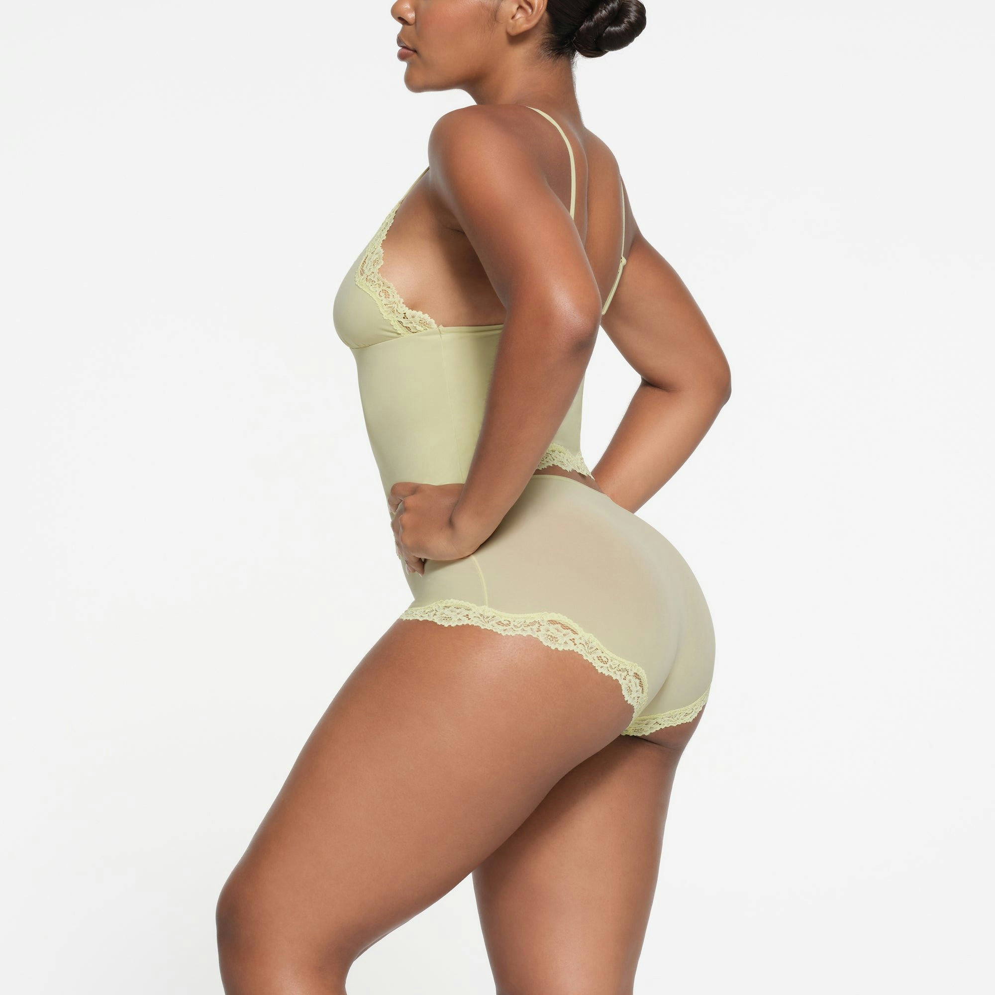 FITS EVERYBODY LACE TRIANGLE CAMI | SAGE ON A MODEL SIDE VIEW