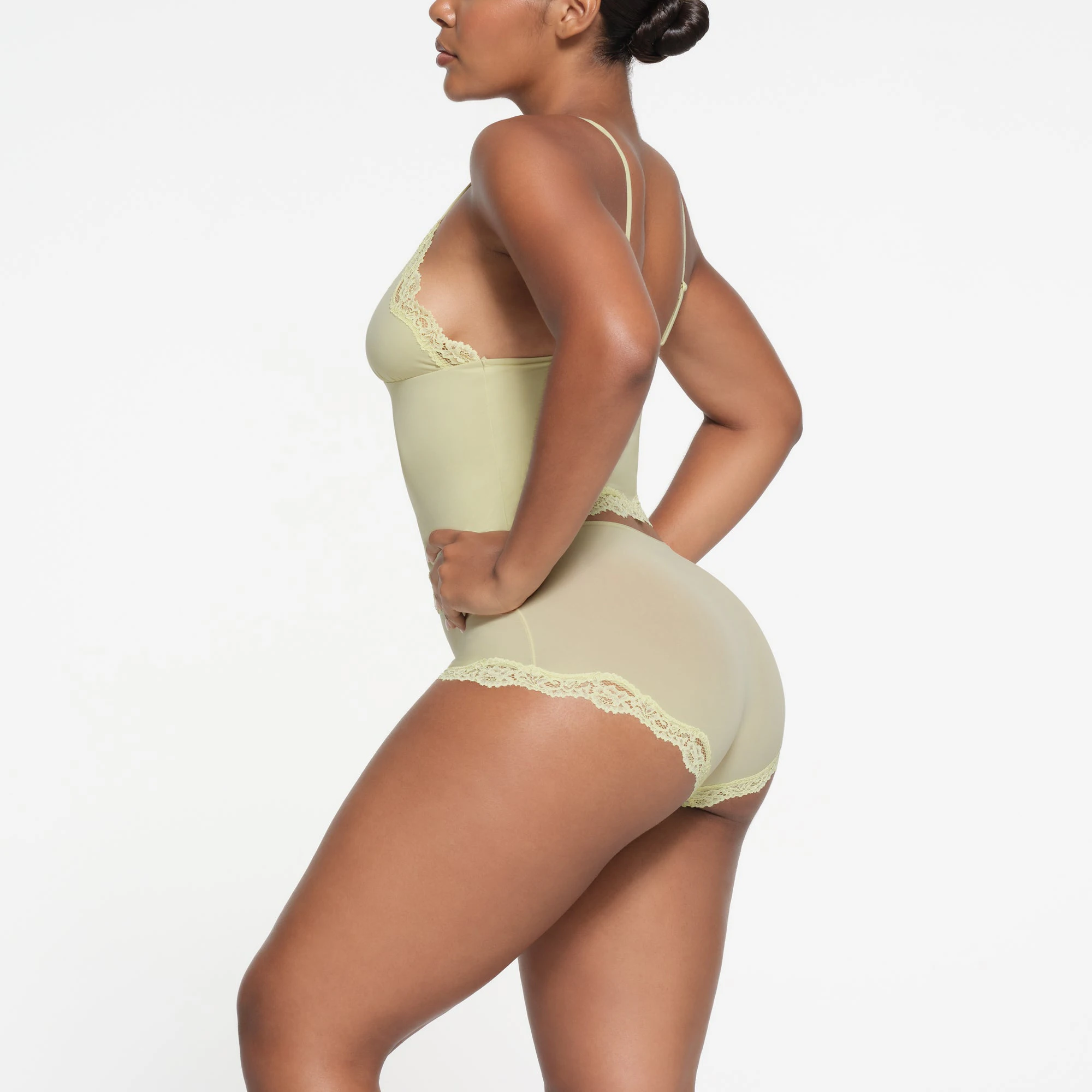 FITS EVERYBODY LACE TRIANGLE CAMI | SAGE ON A MODEL SIDE VIEW