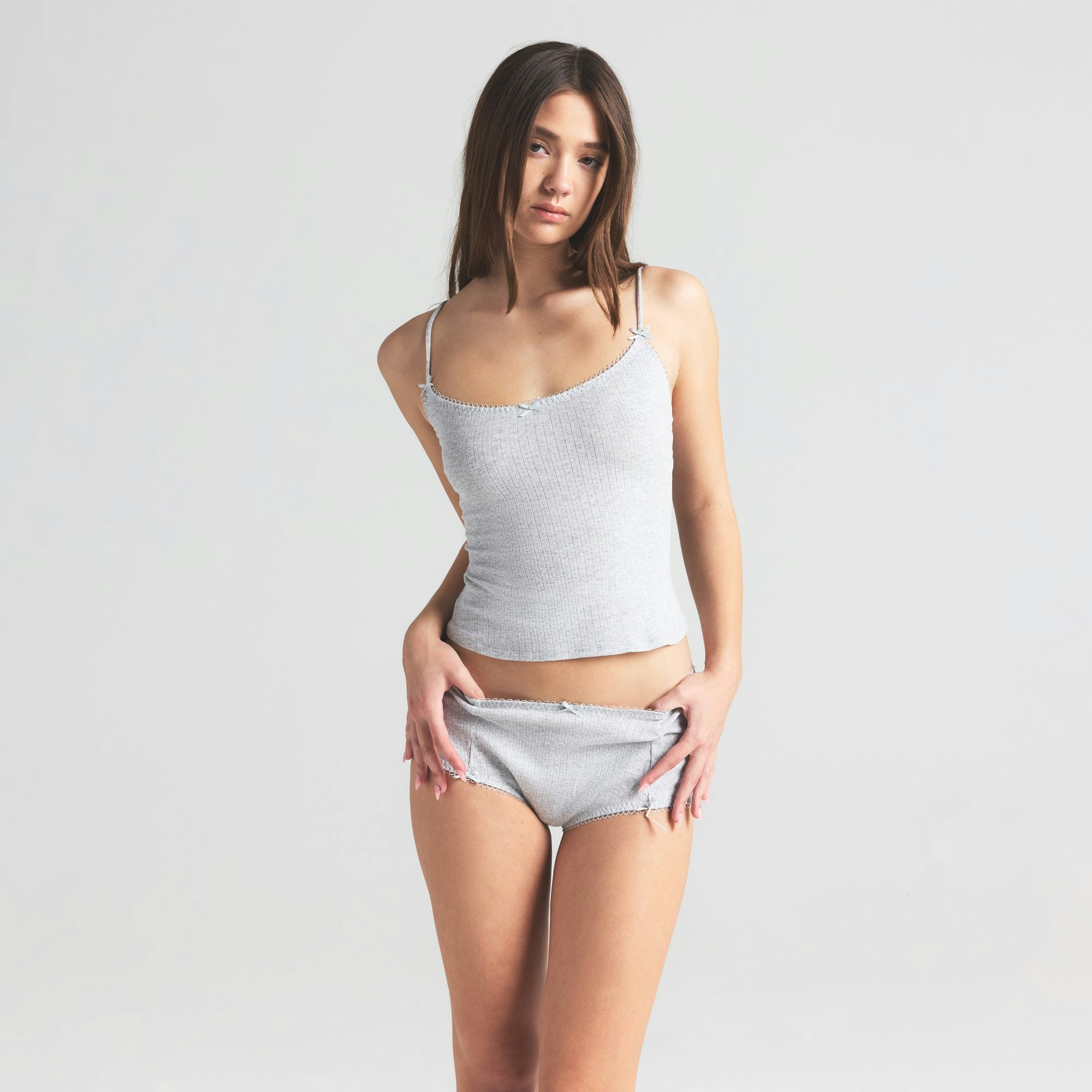 POINTELLE CAMI | LIGHT HEATHER GREY ON A MODEL SIDE VIEW | FOCUS: 0.0, 1.0, 0.9