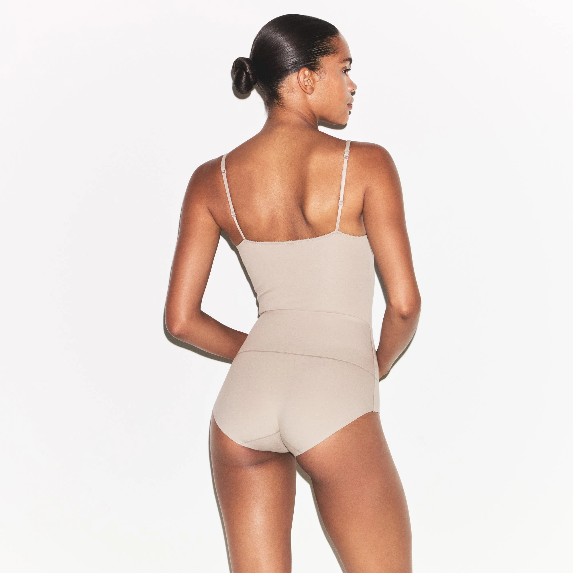 COTTON SHAPEWEAR THONG BODYSUIT | LINEN ON A MODEL BACK VIEW | FOCUS: 0.0, 1.0, 0.9