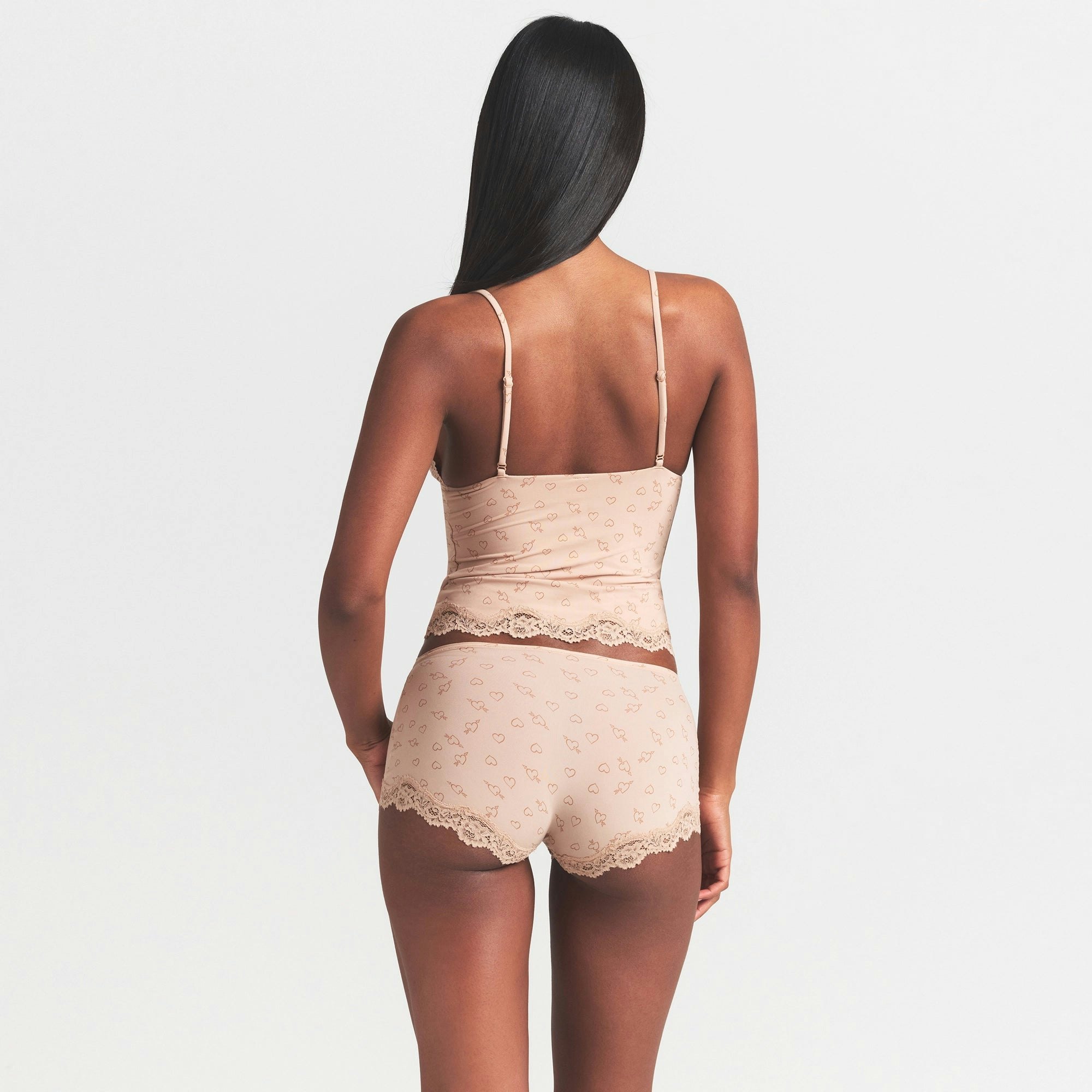 FITS EVERYBODY LACE TRIANGLE CAMI | MICA SKETCHED HEARTS ON A MODEL SIDE VIEW @ | FOCUS: 0.0, 1.0, 0.9