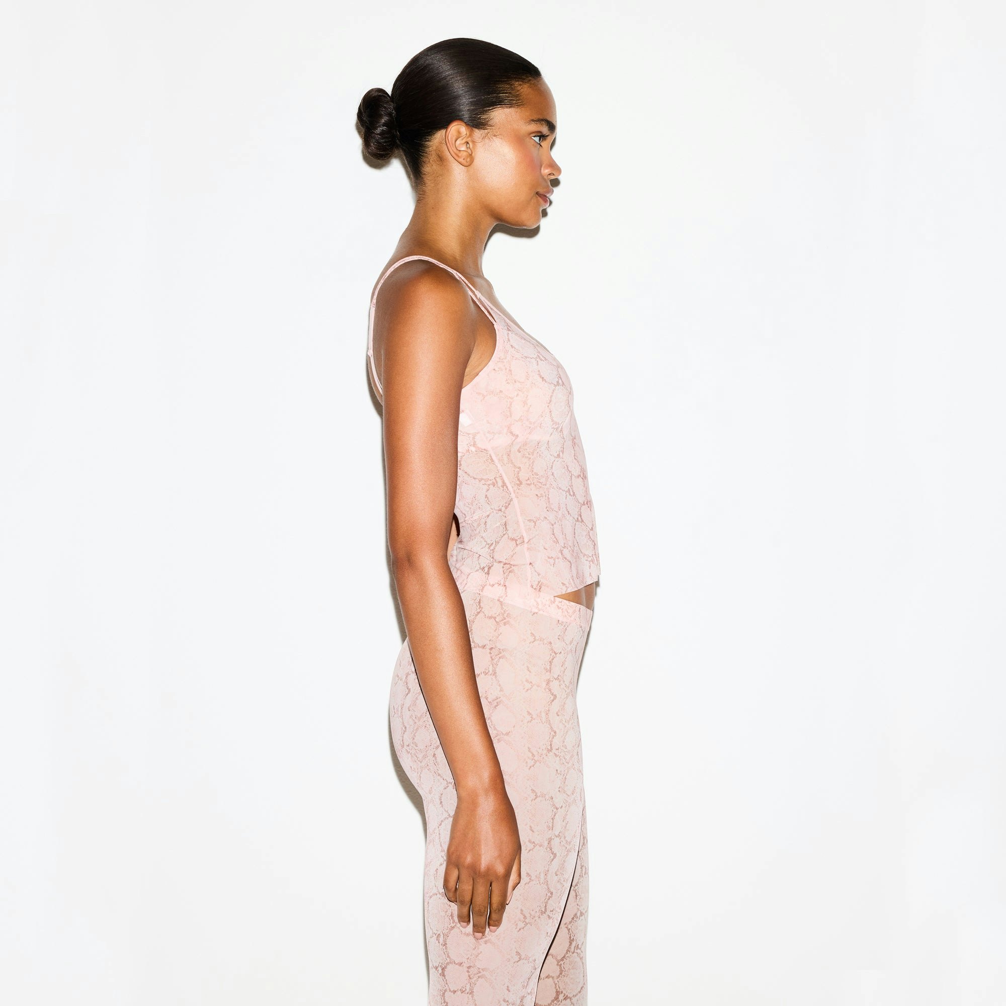 MILKY SHEER CAMI | ROSE PASTEL SNAKE PRINT ON A MODEL SIDE VIEW @ | FOCUS: 0.0, 1.0, 0.9