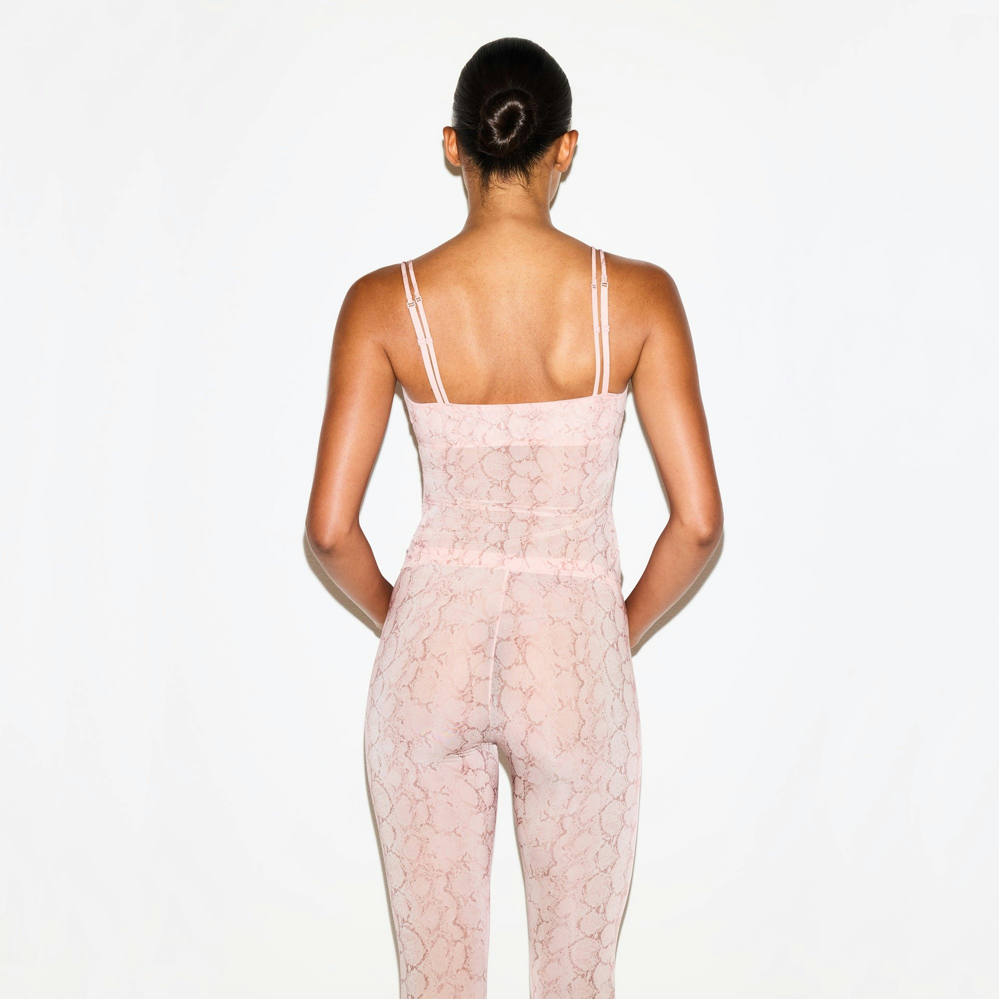 MILKY SHEER CAMI | ROSE PASTEL SNAKE PRINT ON A MODEL SIDE VIEW @ | FOCUS: 0.0, 1.0, 0.9