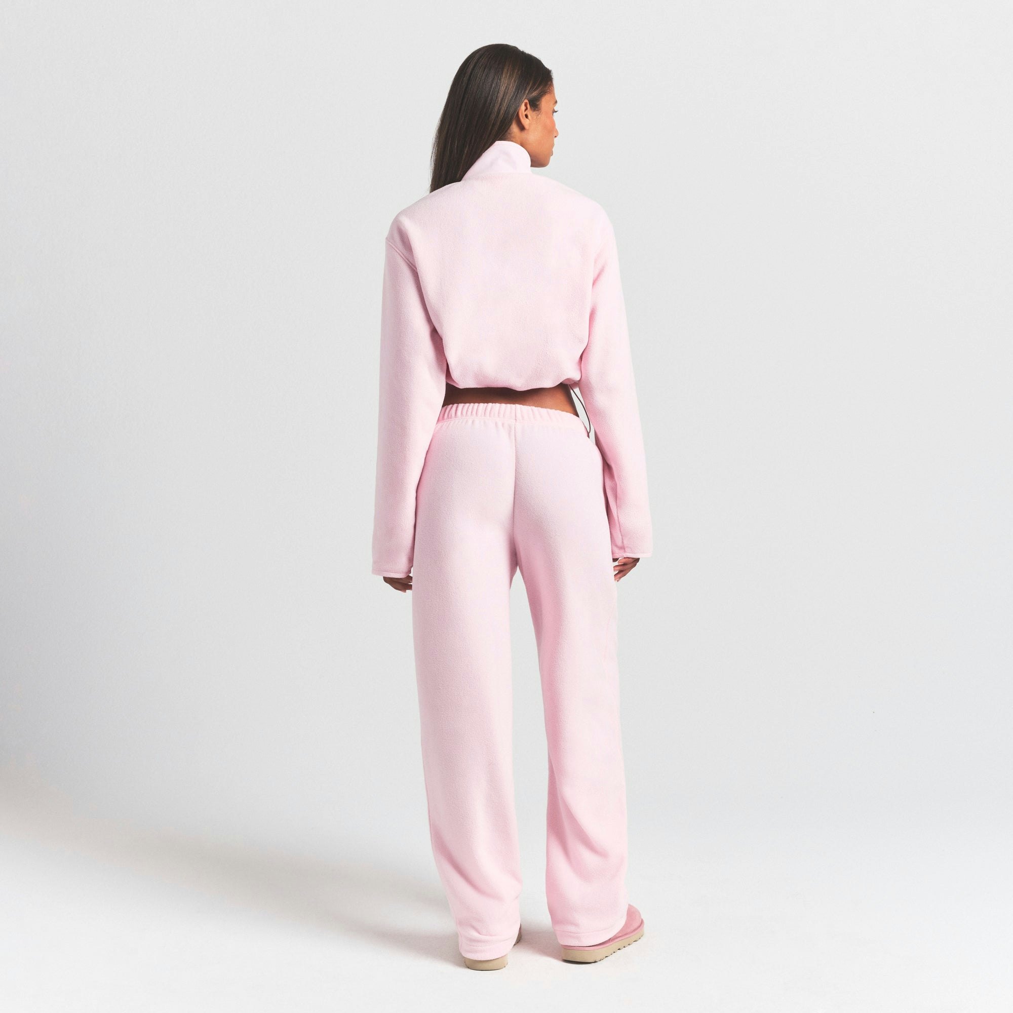 OUTDOOR FLEECE HALF ZIP PULLOVER | CHERRY BLOSSOM ON A MODEL SIDE VIEW @ | FOCUS: 0.0, 1.0, 0.9