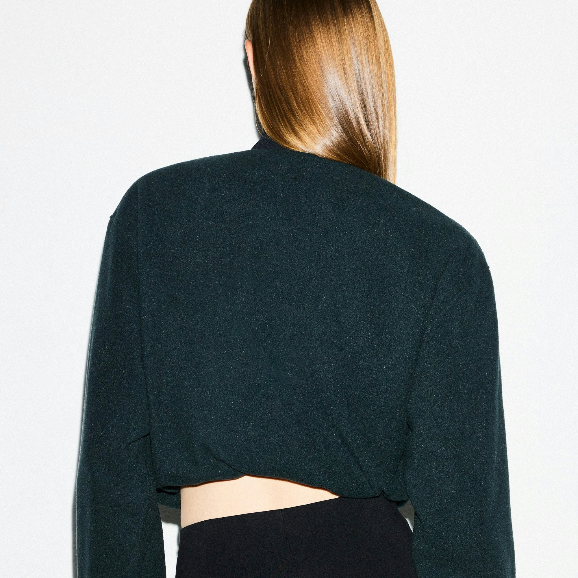 OUTDOOR FLEECE HALF ZIP PULLOVER | DARK TEAL ON A MODEL SIDE VIEW @ | FOCUS: 0.0, 1.0, 0.9