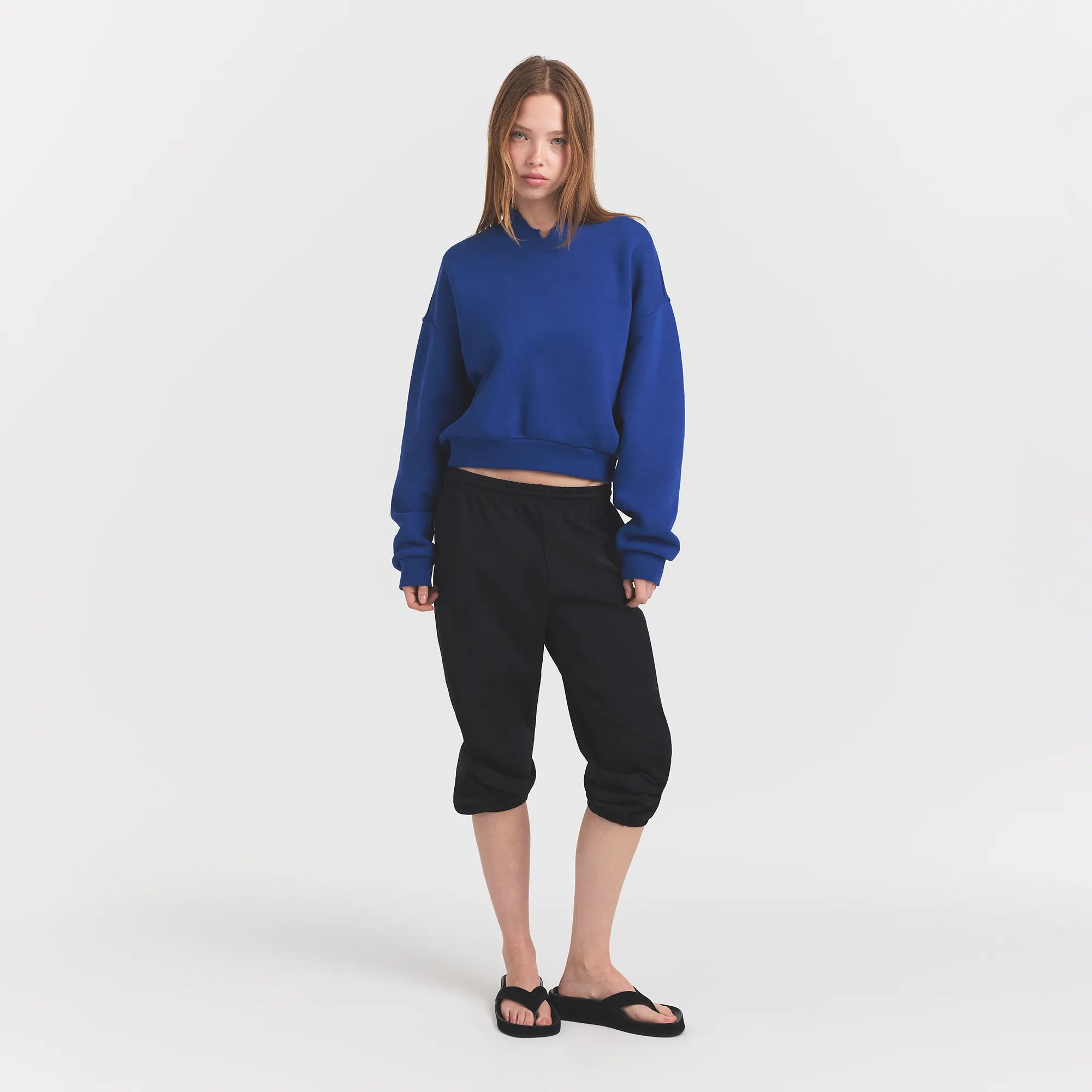 HEAVYWEIGHT FLEECE CREWNECK | COBALT ON A MODEL FRONT VIEW @ | FOCUS: 0.0, 1.0, 0.9