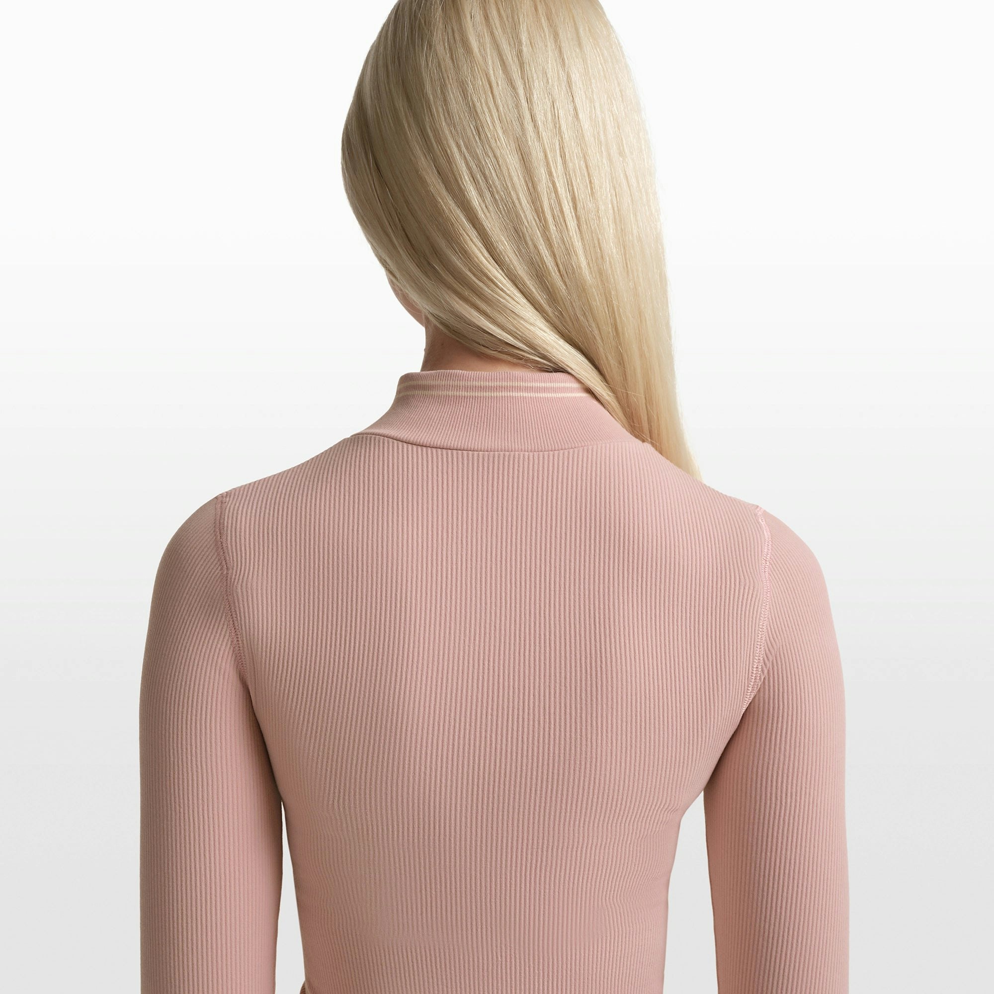 NikeSKIMS RIBBED SEAMLESS ZIP UP CROP JACKET | HIMALAYAN/ECRU ON A MODEL FRONT VIEW @ | FOCUS: 0.0, 1.0, 0.9