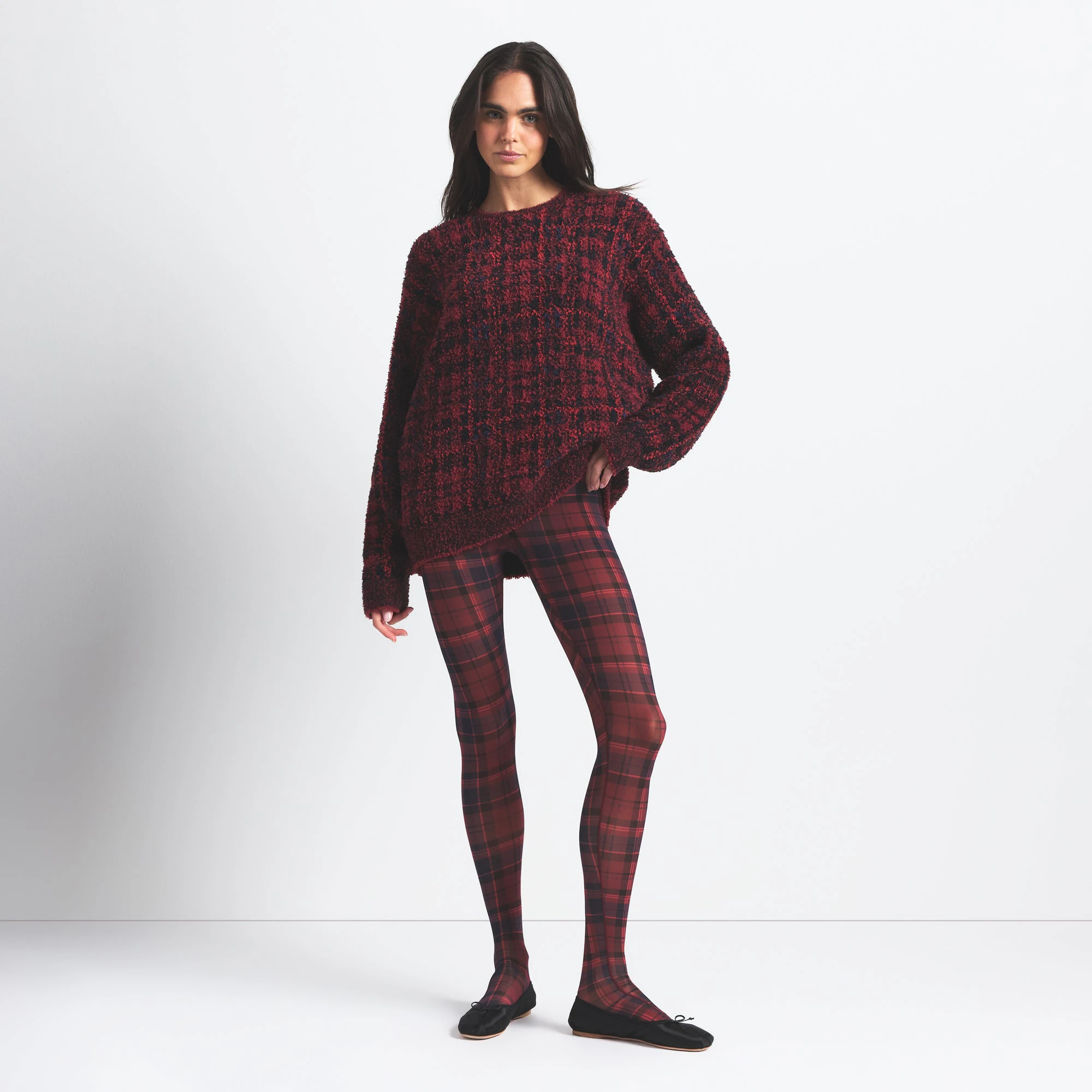 COZY OVERSIZED CREWNECK PULLOVER | MERLOT NAVY PLAID ON A MODEL FRONT VIEW @ | FOCUS: 0.0, 1.0, 0.9