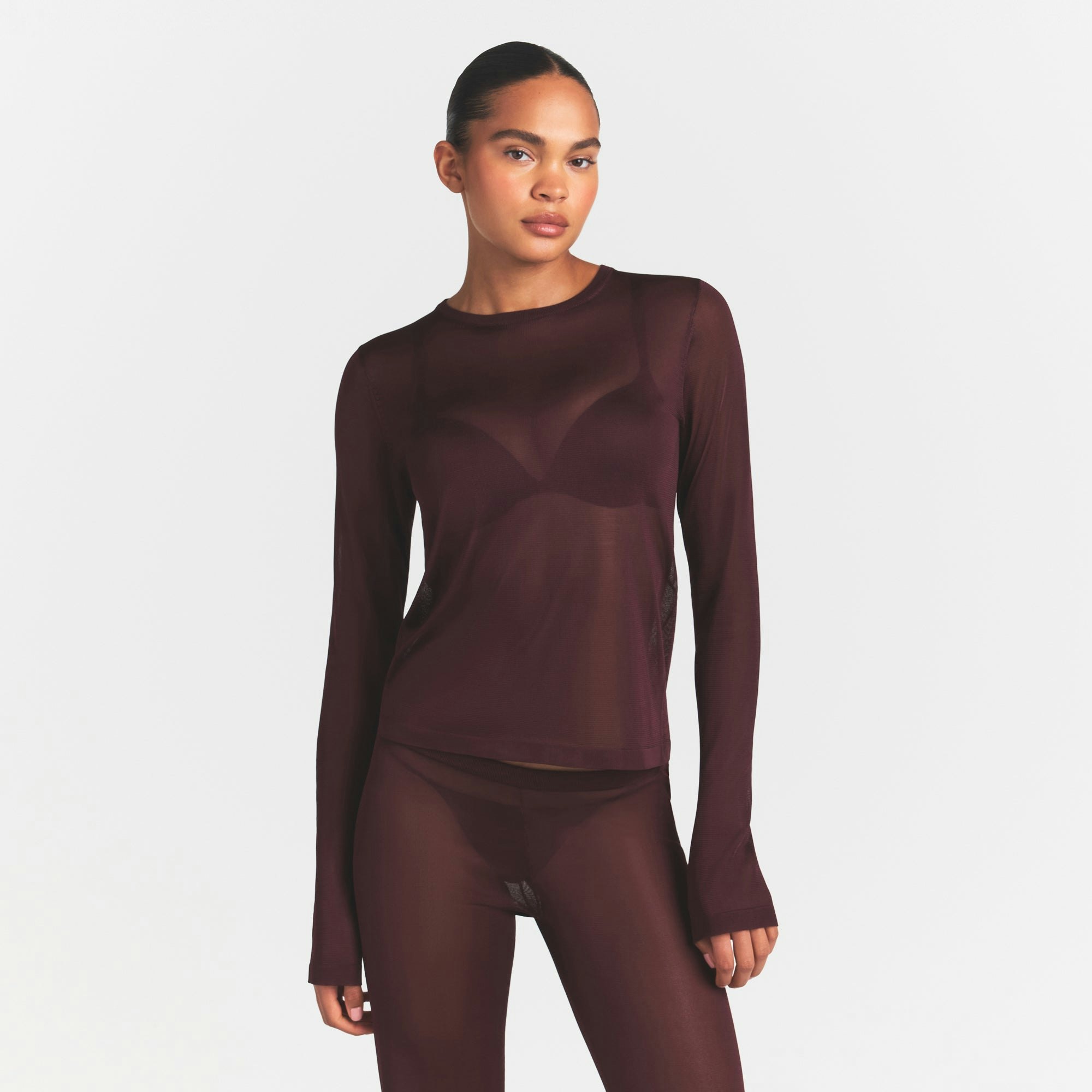 SLINKY KNIT CREW NECK LONG SLEEVE TOP | CURRANT ON A MODEL SIDE VIEW @ | FOCUS: 0.0, 1.0, 0.9