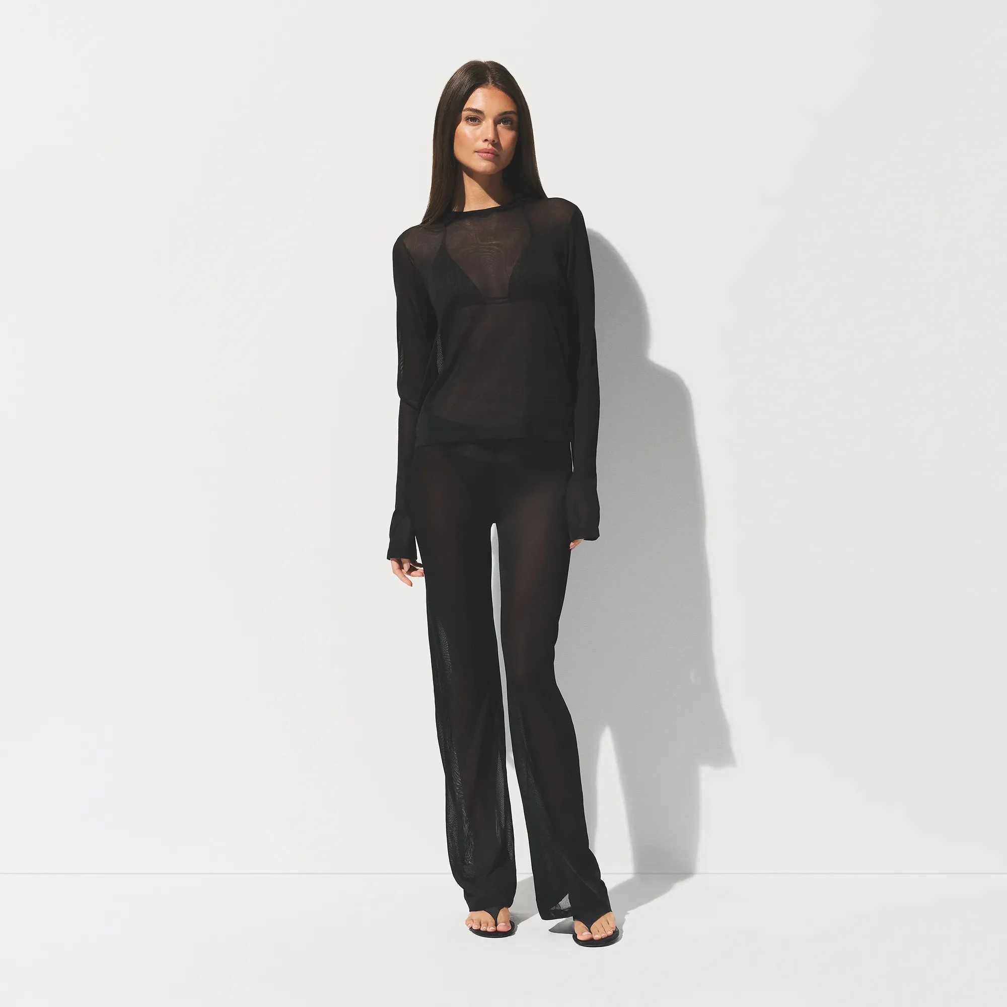 SLINKY KNIT CREW NECK LONG SLEEVE TOP | OBSIDIAN ON A MODEL FRONT VIEW @ | FOCUS: 0.0, 1.0, 0.9