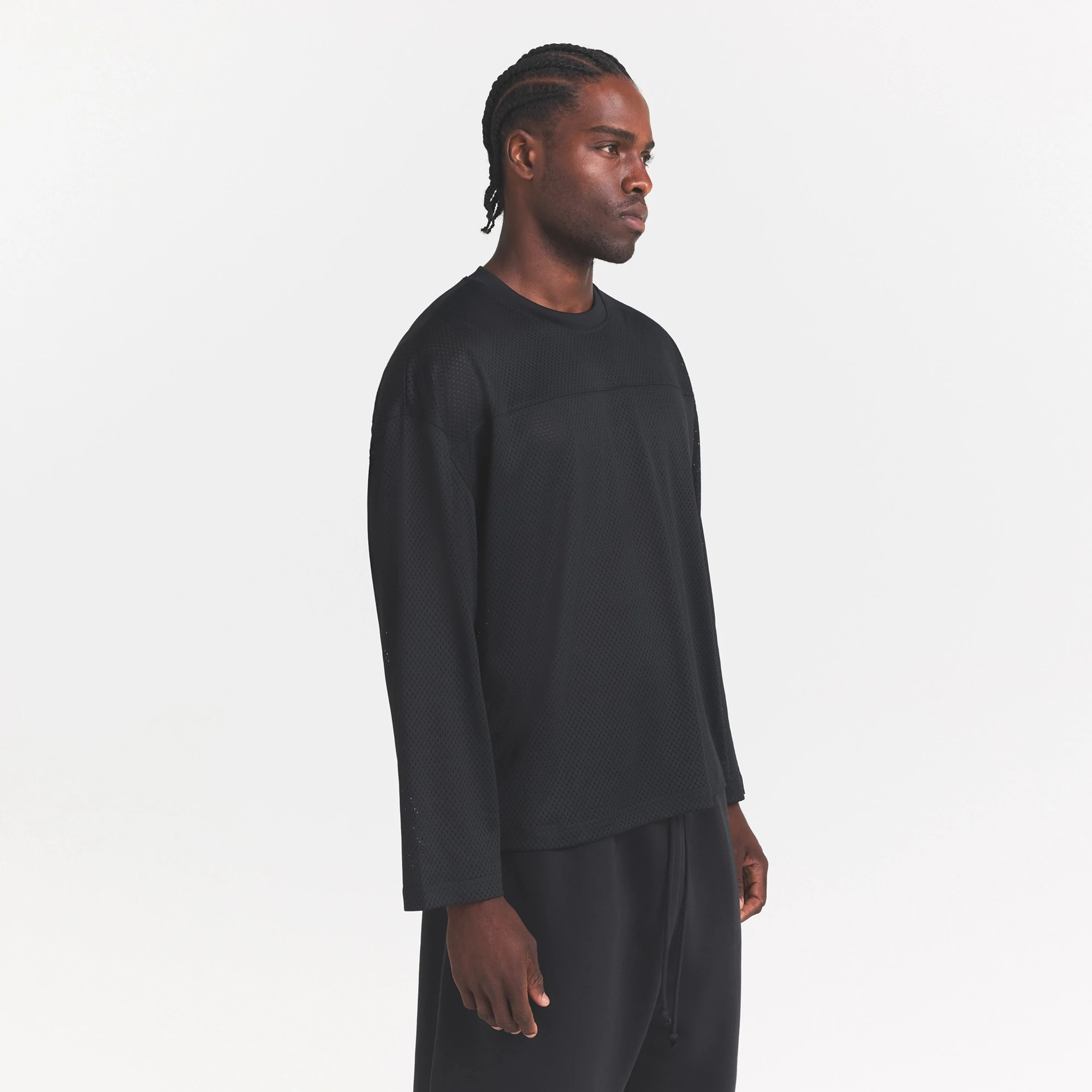MESH APPAREL MENS LONG SLEEVE JERSEY | ONYX ON A MODEL SIDE VIEW @ | FOCUS: 0.0, 1.0, 0.9