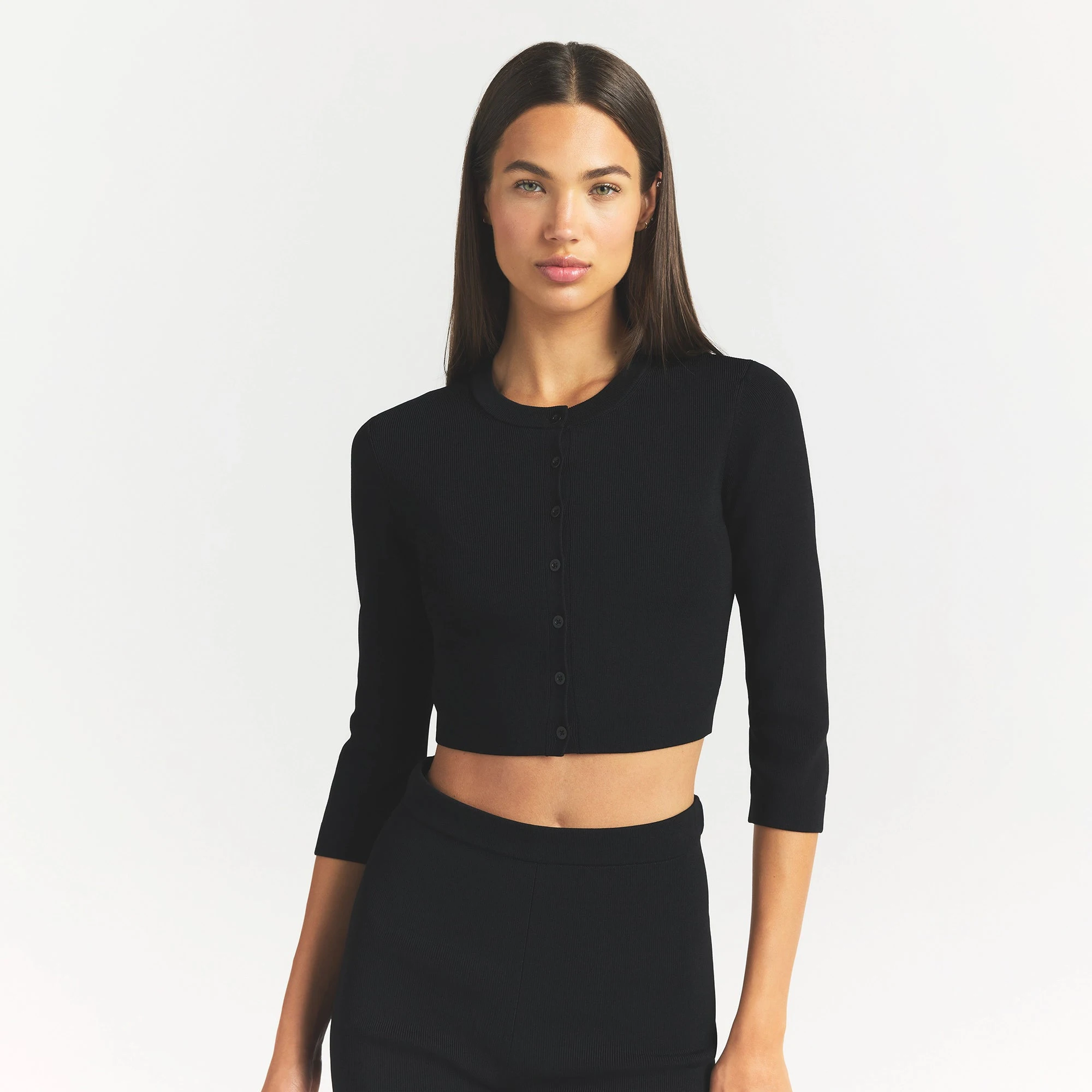 REFINED KNIT CROPPED CARDIGAN | OBSIDIAN ON A MODEL FRONT VIEW @ | FOCUS: 0.0, 1.0, 0.9