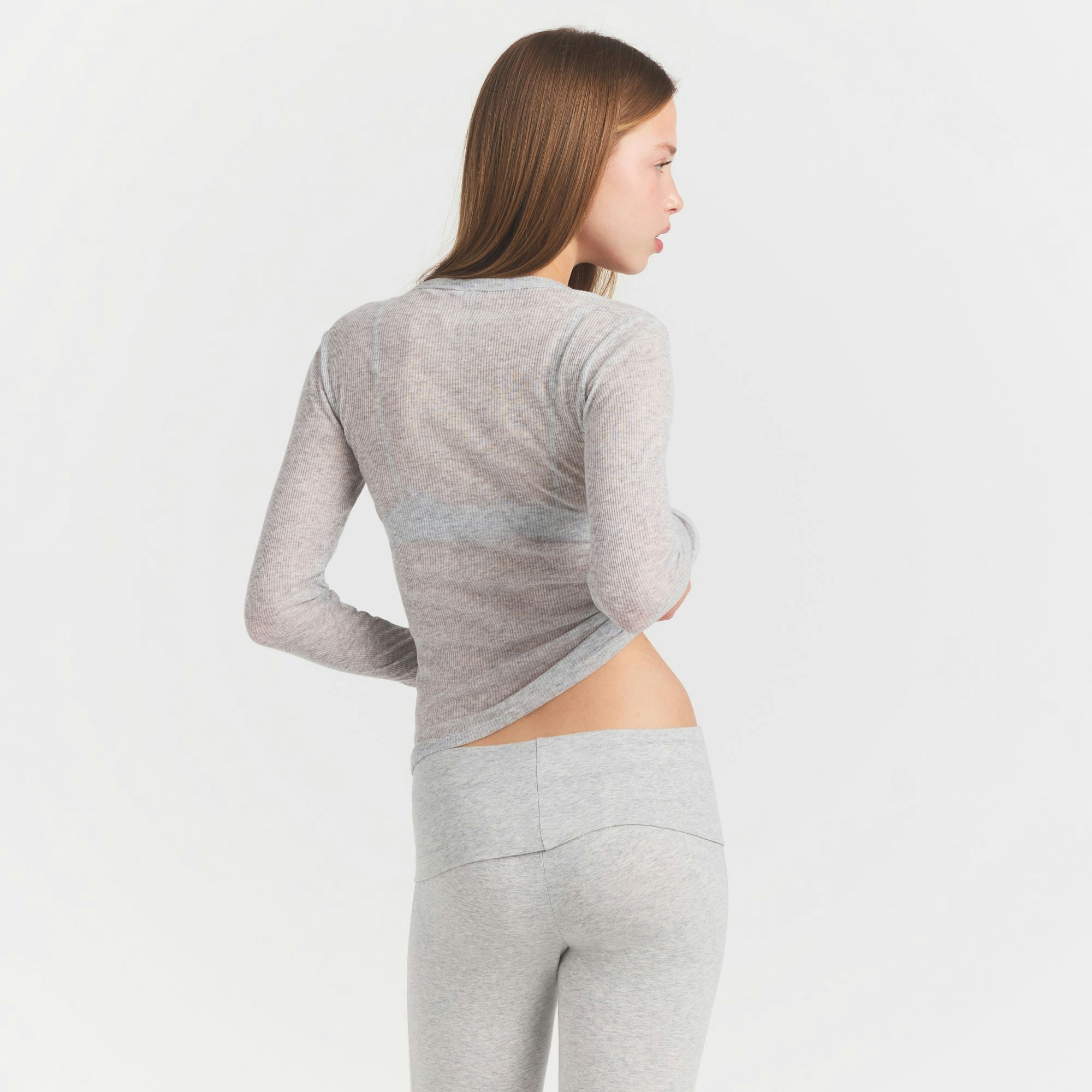 SHEER RIB HENLEY | LIGHT HEATHER GREY ON A MODEL SIDE VIEW @ | FOCUS: 0.0, 1.0, 0.9