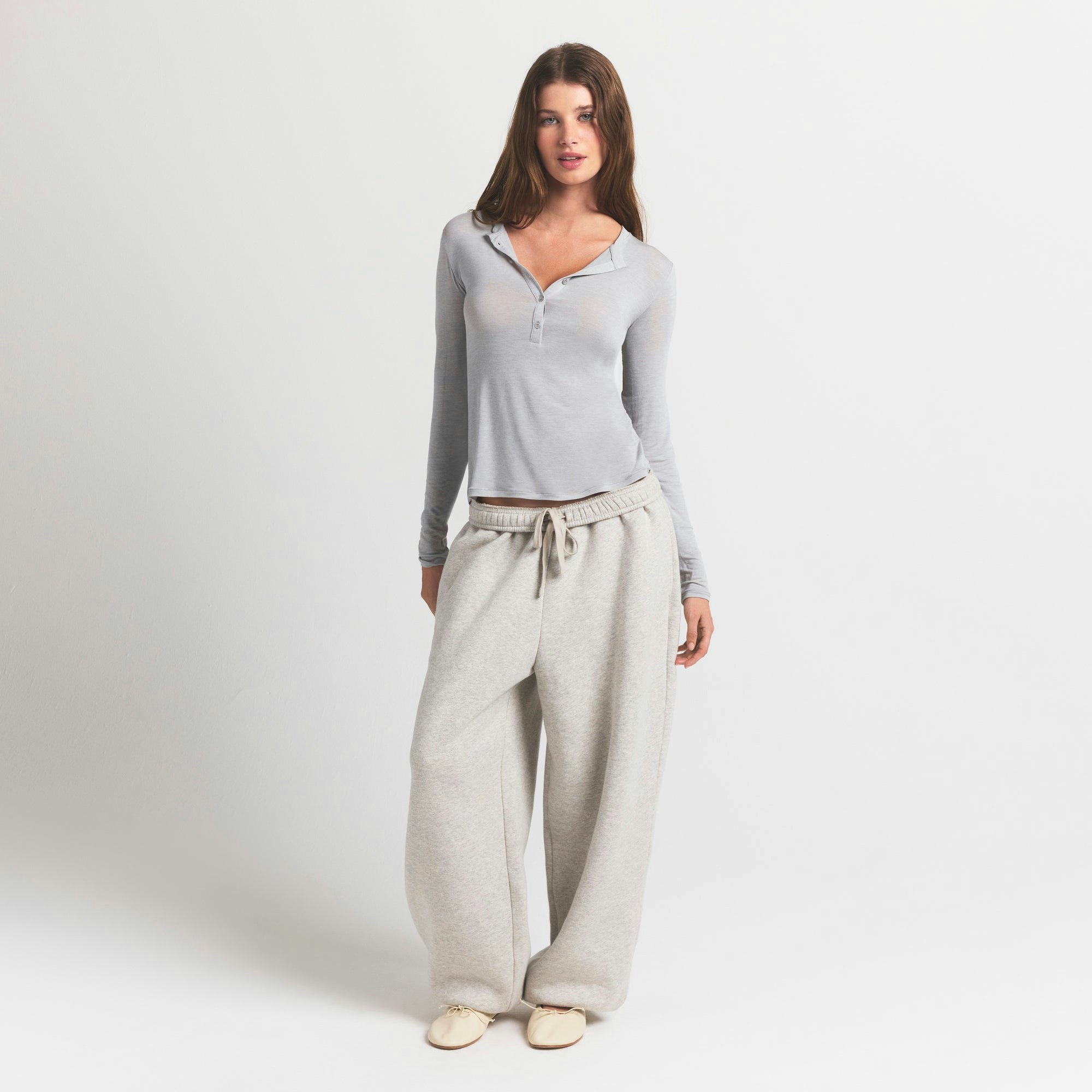 SHEER MODAL CREW NECK HENLEY | HEATHER GREY ON A MODEL FRONT VIEW @ | FOCUS: 0.9, 0.1, 0.7