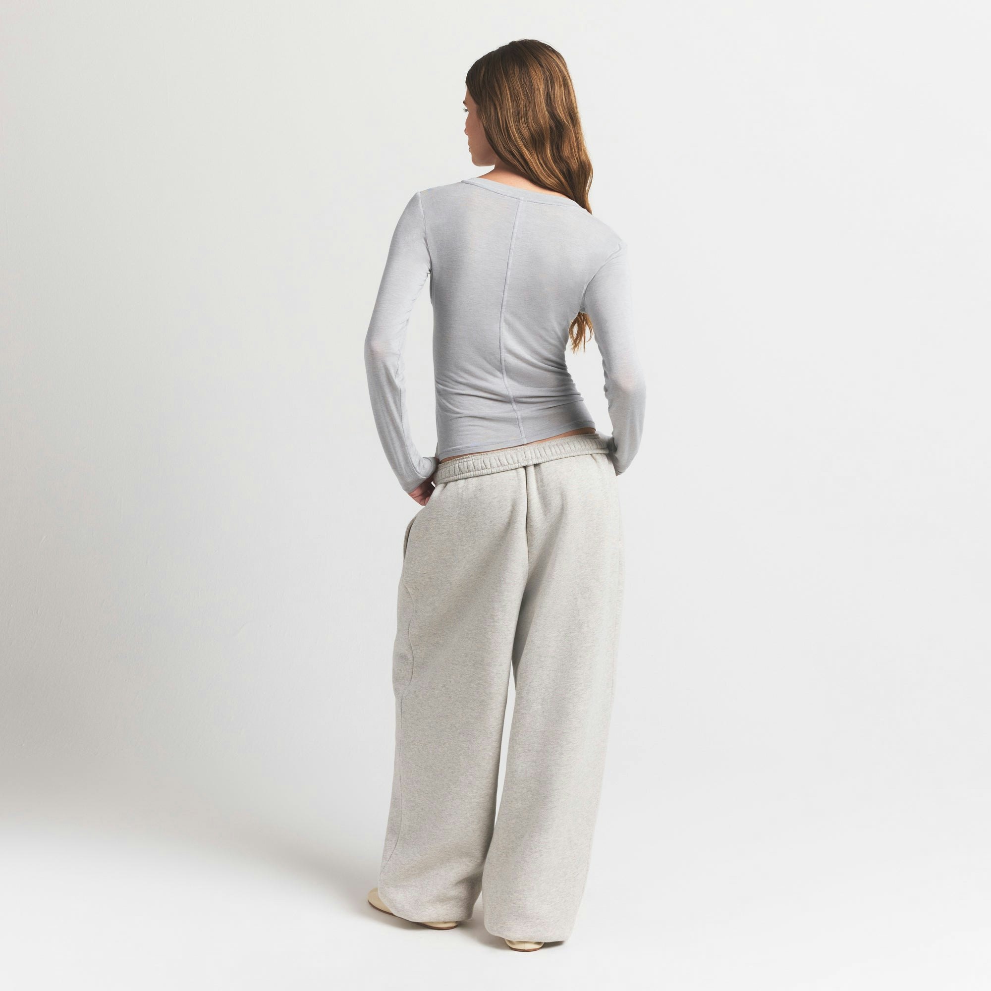 SHEER MODAL CREW NECK HENLEY | HEATHER GREY ON A MODEL BACK VIEW @ | FOCUS: 0.9, 0.1, 0.7