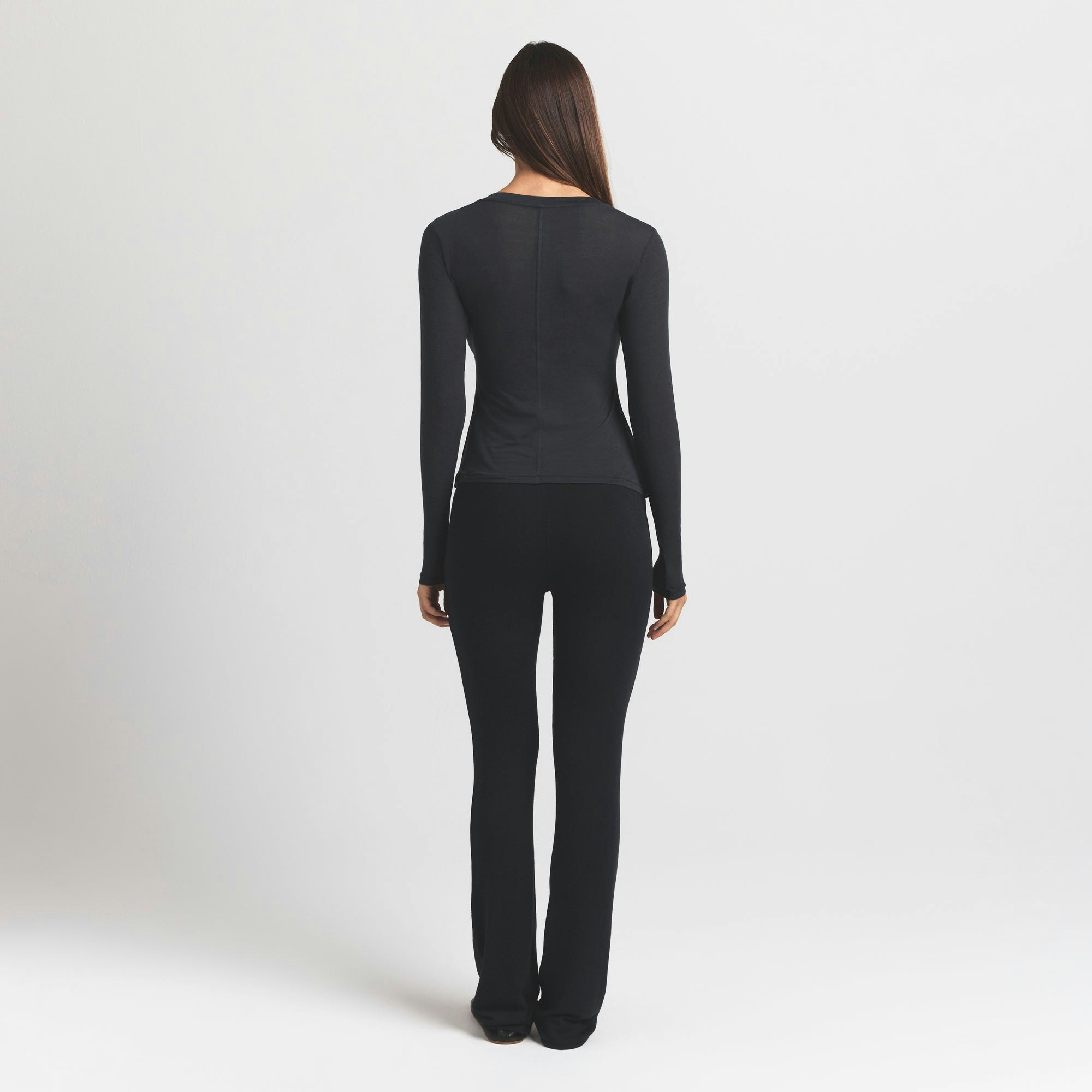 SHEER MODAL CREW NECK HENLEY | ONYX ON A MODEL BACK VIEW @ | FOCUS: 0.9, 0.1, 0.7