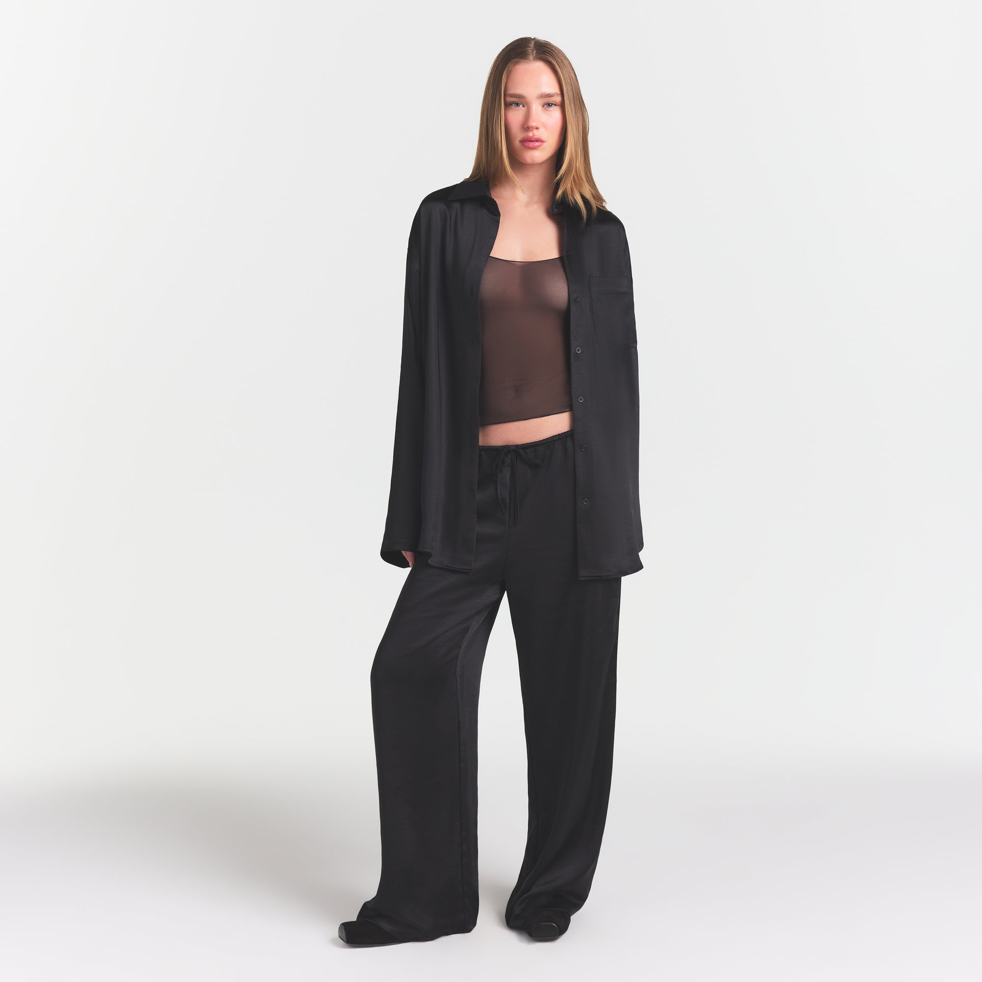 LIGHTWEIGHT SATIN OVERSIZED SHIRT | OBSIDIAN ON A MODEL FRONT VIEW @ | FOCUS: 0.0, 1.0, 0.9