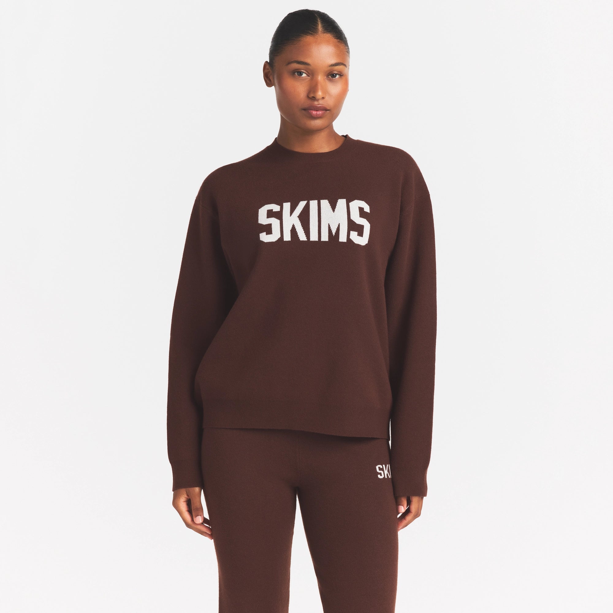 SWEATER KNIT LOGO PULLOVER | COCOA EGRET & LAYS FLAT ON A WHITE BACKGROUND | FLT @ | FOCUS: 0.0, 1.0, 0.9