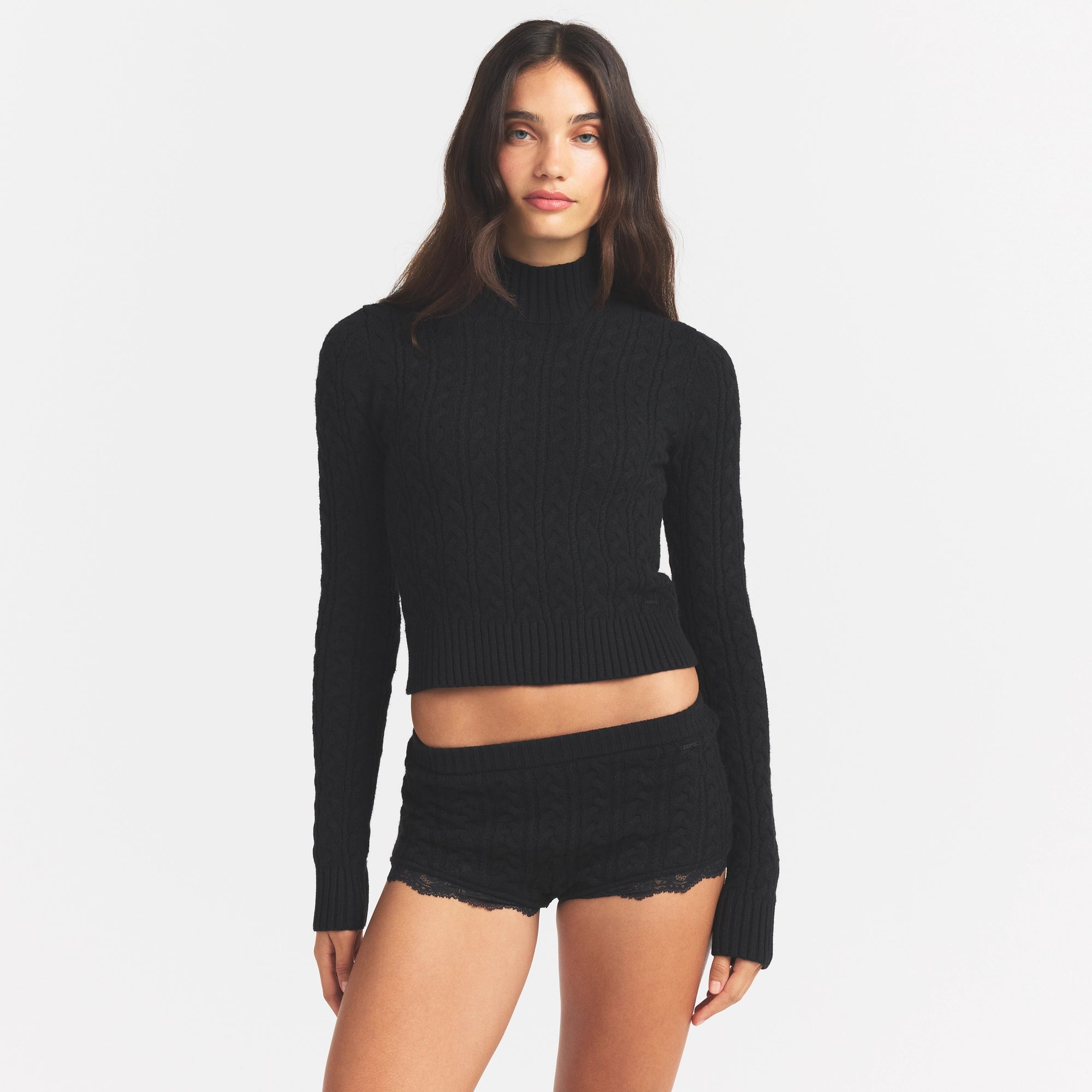 SWEATER KNIT TURTLENECK | ONYX ON A MODEL SIDE VIEW @ | FOCUS: 0.0, 1.0, 0.9