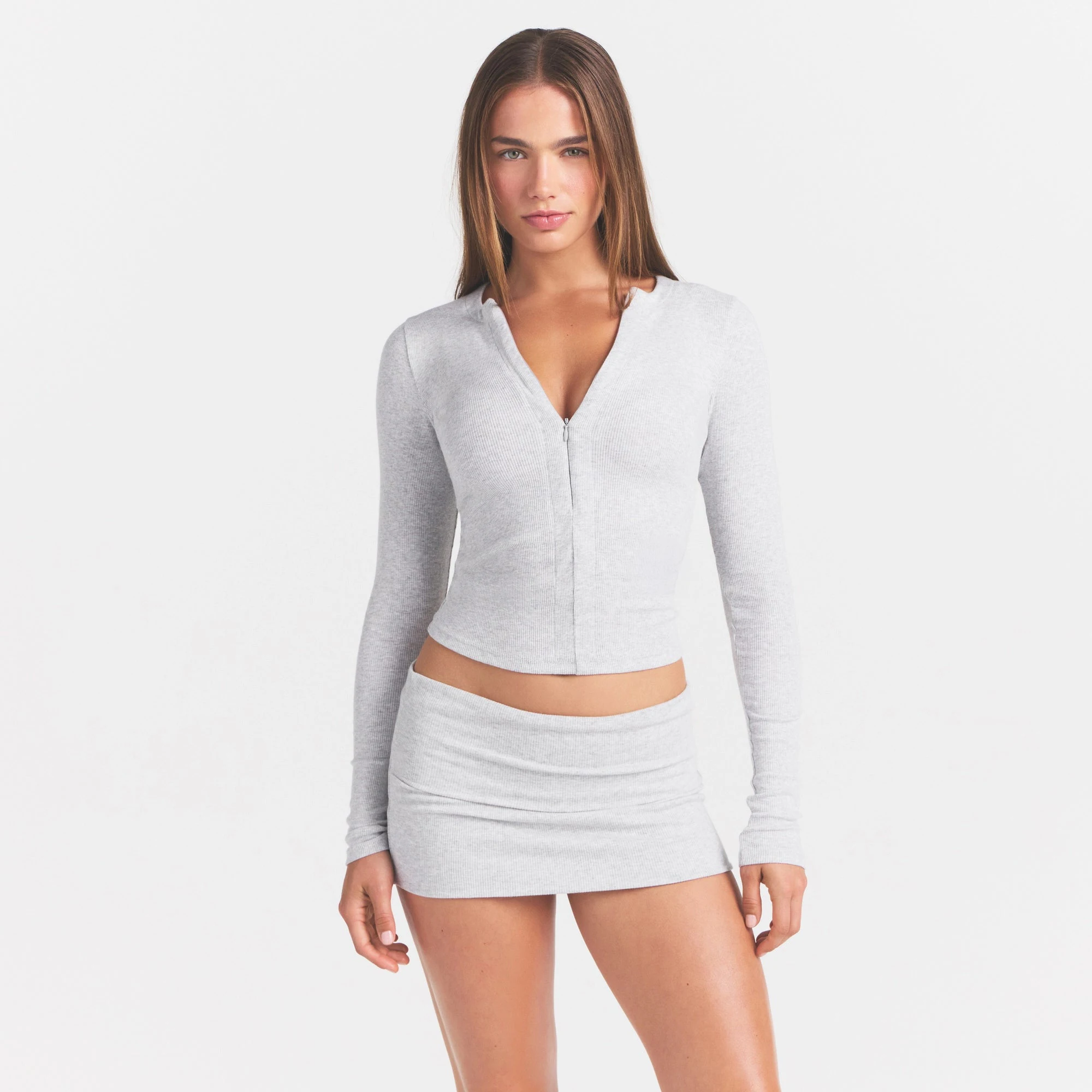 COTTON RIB ZIP UP TOP | LIGHT HEATHER GREY ON A MODEL FRONT VIEW @ | FOCUS: 0.0, 1.0, 0.9
