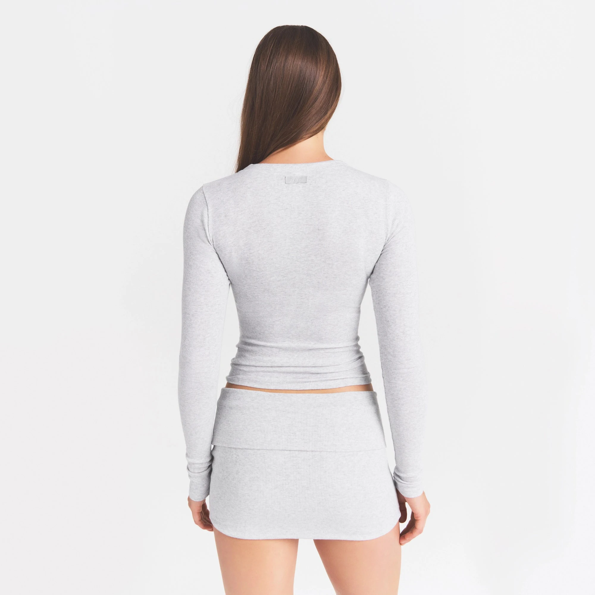 COTTON RIB ZIP UP TOP | LIGHT HEATHER GREY ON A MODEL BACK VIEW @ | FOCUS: 0.0, 1.0, 0.9