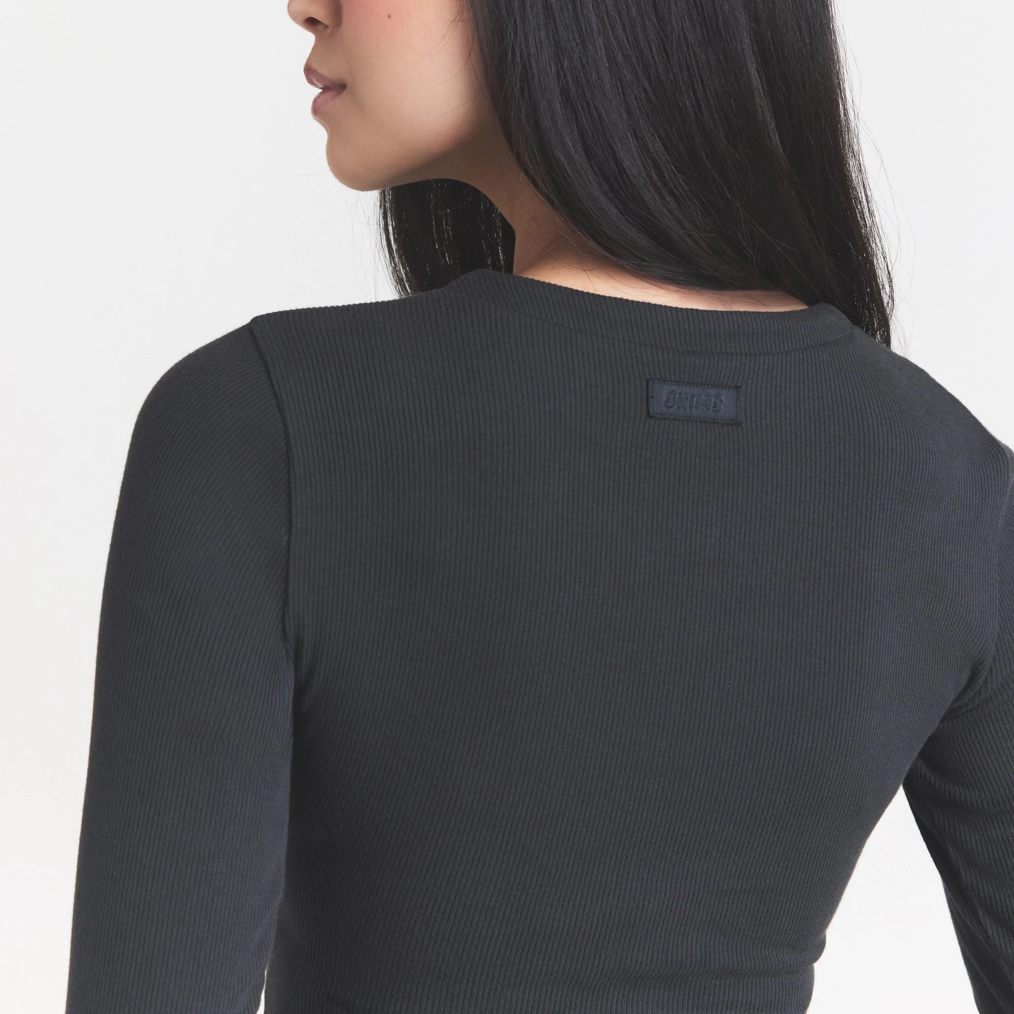 COTTON RIB ZIP UP TOP | SOOT ON A MODEL FRONT VIEW @ | FOCUS: 0.0, 1.0, 0.9