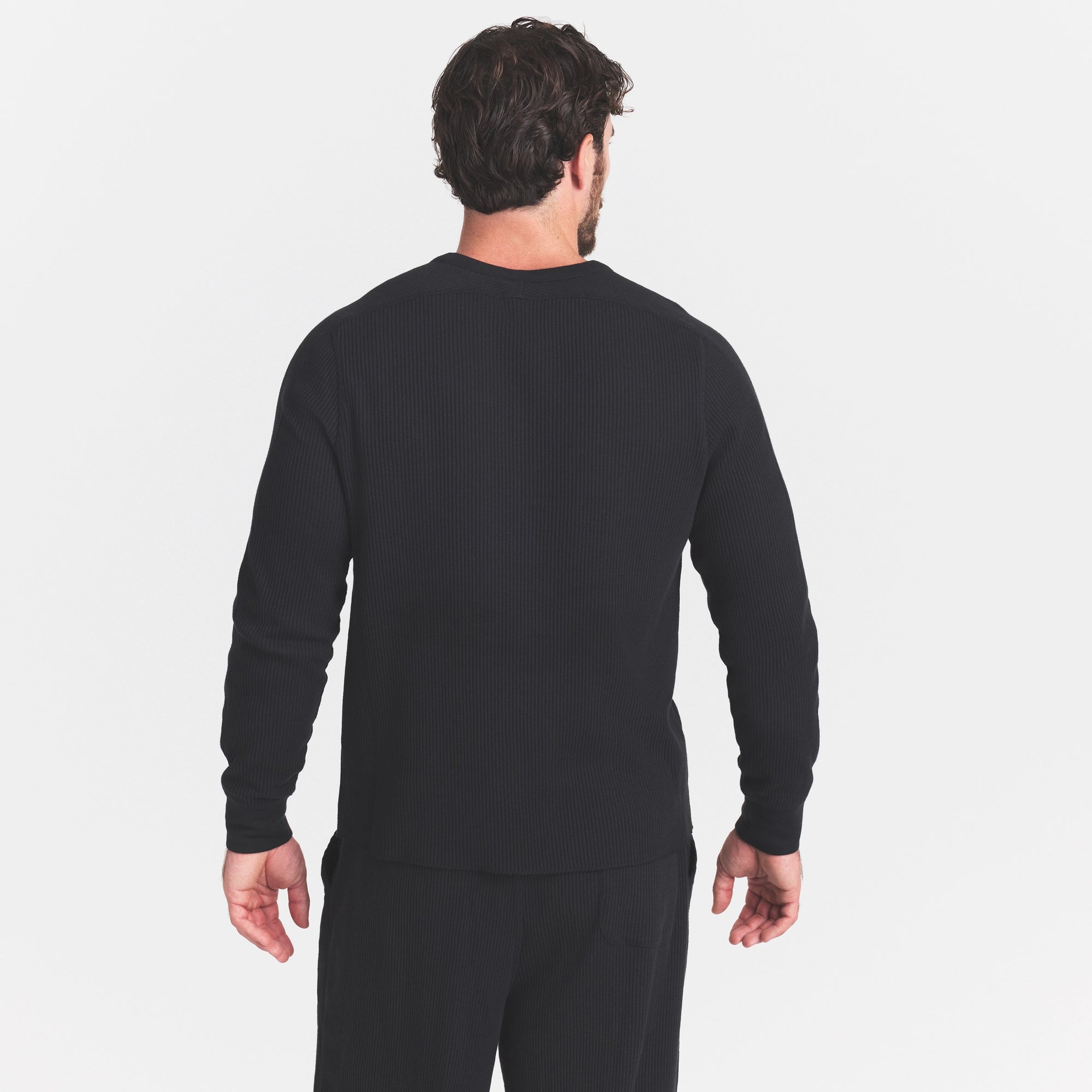 WAFFLE MENS CROPPED SLIM HENLEY | ONYX ON A MODEL SIDE VIEW @ | FOCUS: 0.0, 1.0, 0.9