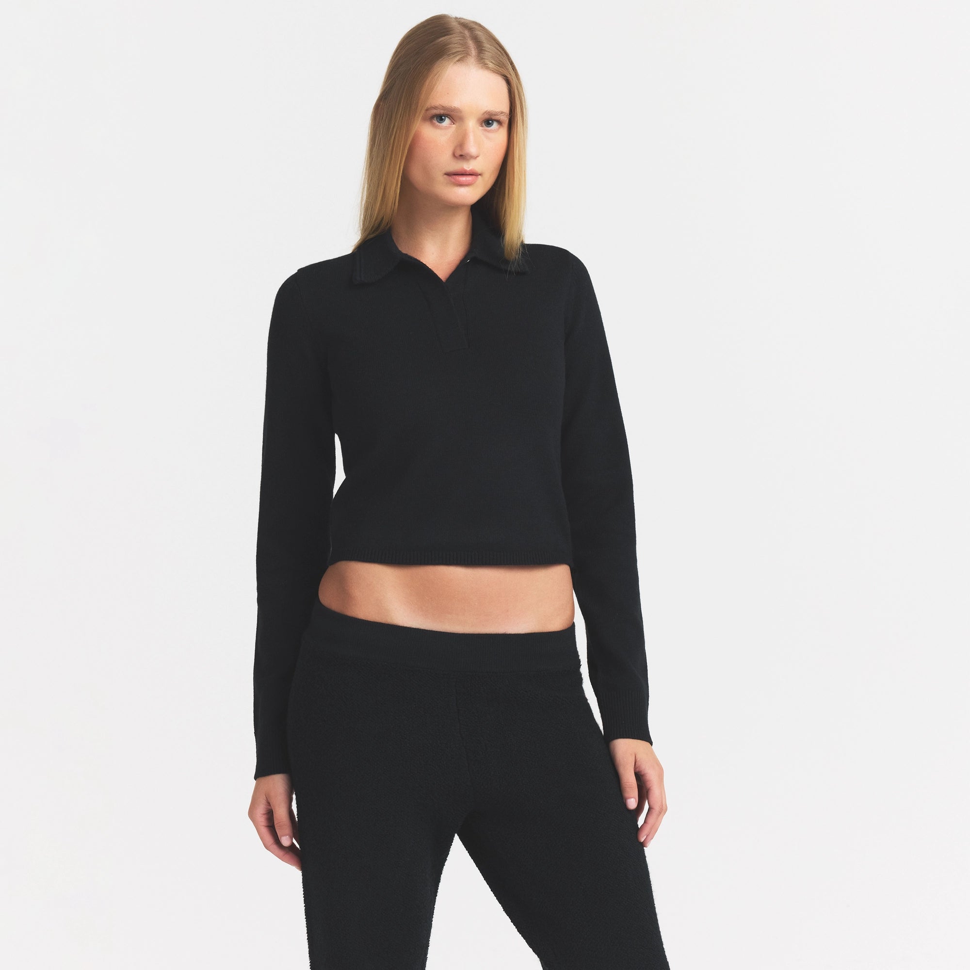 SWEATER KNIT LONG SLEEVE CROPPED POLO | ONYX ON A MODEL SIDE VIEW @ | FOCUS: 0.0, 1.0, 0.9
