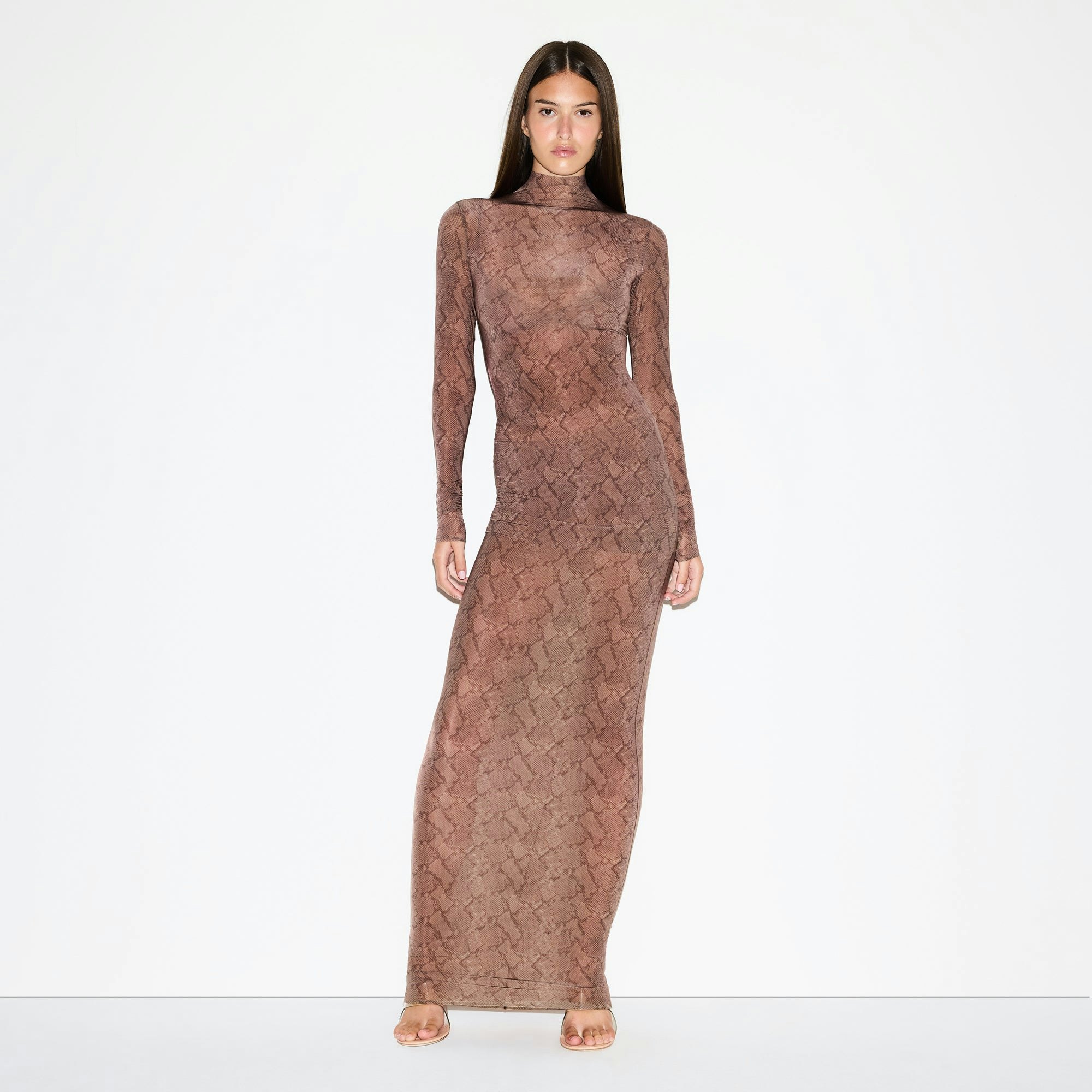 MILKY SHEER TUNIC | JASPER SNAKE PRINT ON A MODEL FRONT VIEW @ | FOCUS: 0.0, 1.0, 0.9