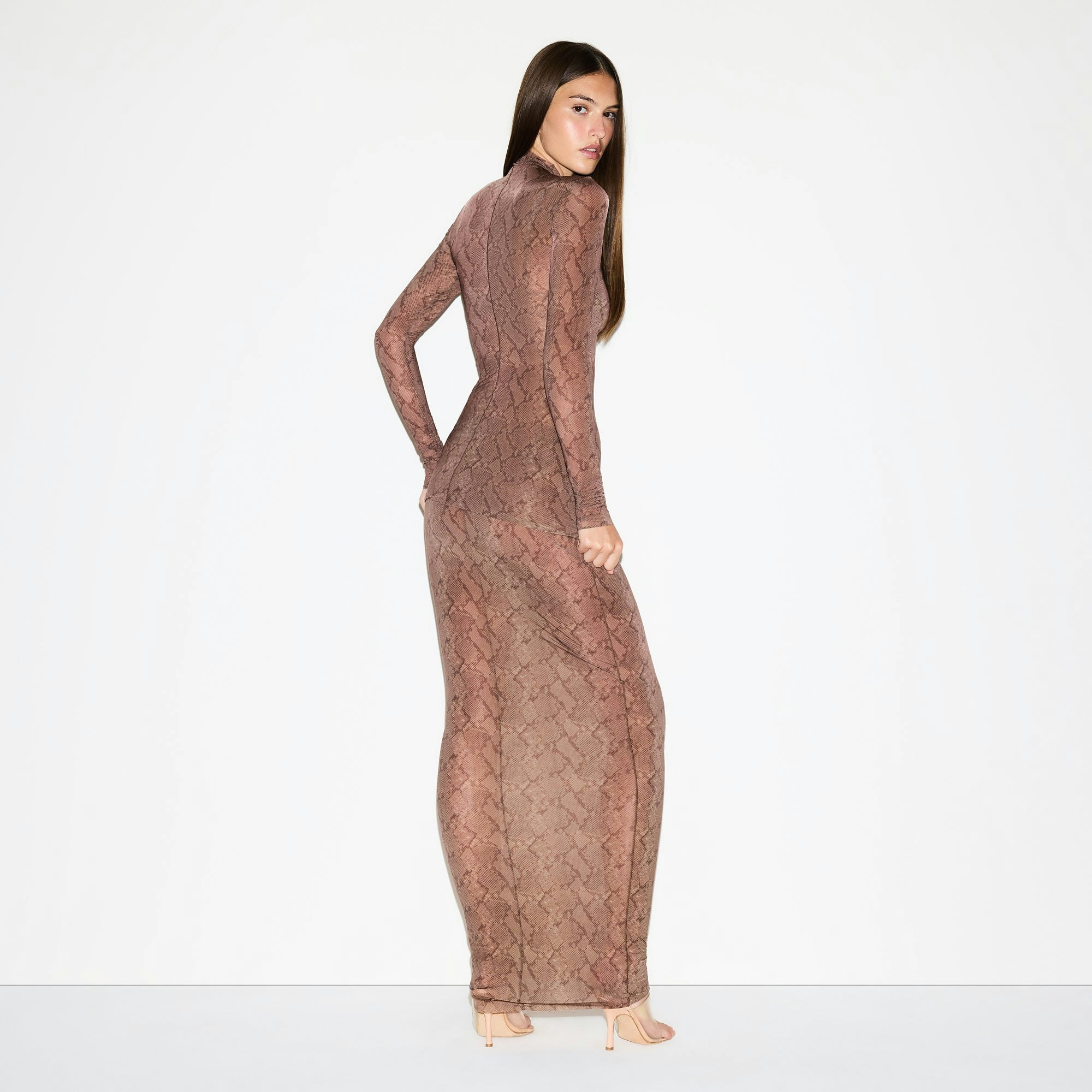MILKY SHEER TUNIC | JASPER SNAKE PRINT ON A MODEL FRONT VIEW @ | FOCUS: 0.0, 1.0, 0.9