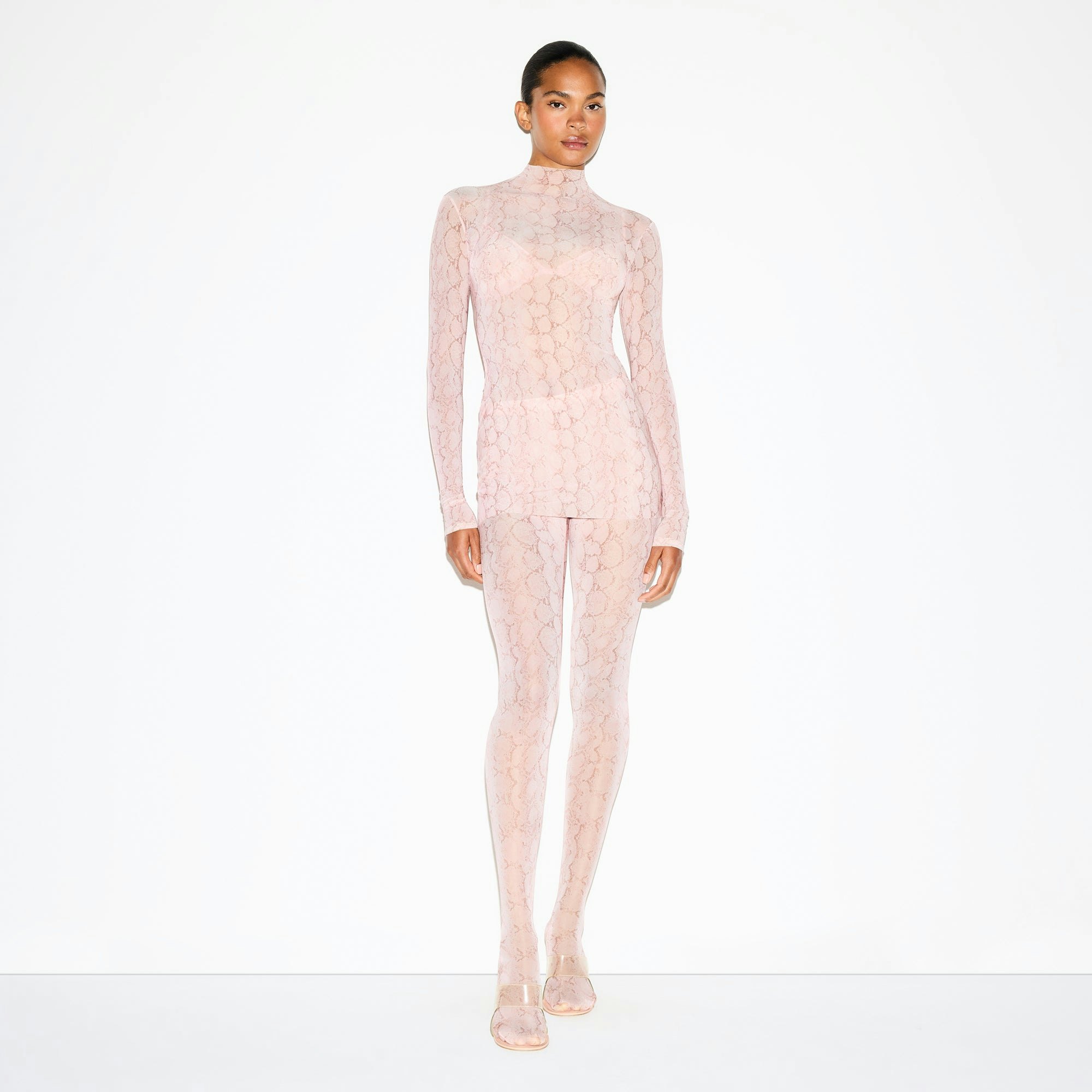 MILKY SHEER TUNIC | ROSE PASTEL SNAKE PRINT ON A MODEL FRONT VIEW @ | FOCUS: 0.0, 1.0, 0.9