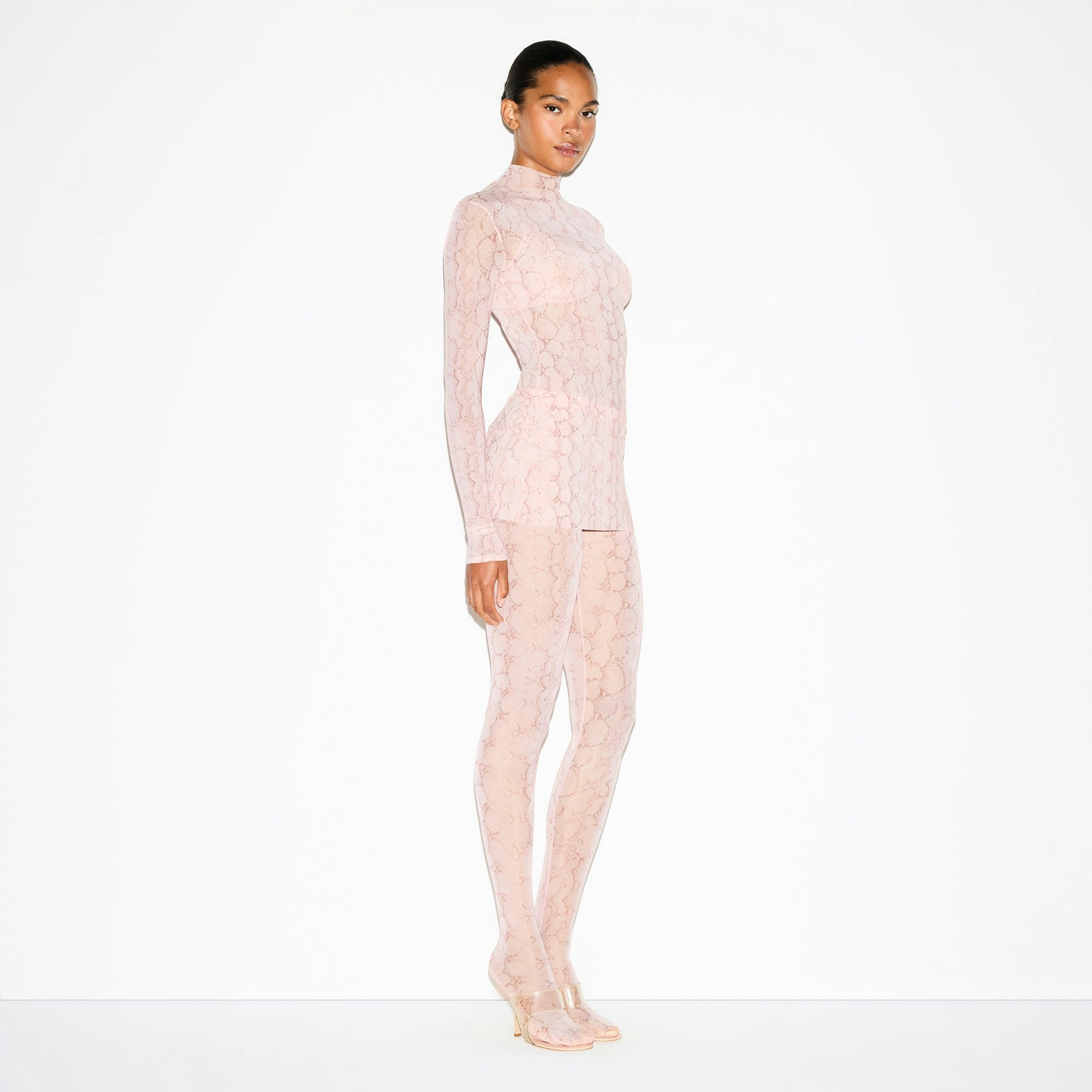 MILKY SHEER TUNIC | ROSE PASTEL SNAKE PRINT ON A MODEL FRONT VIEW @ | FOCUS: 0.0, 1.0, 0.9