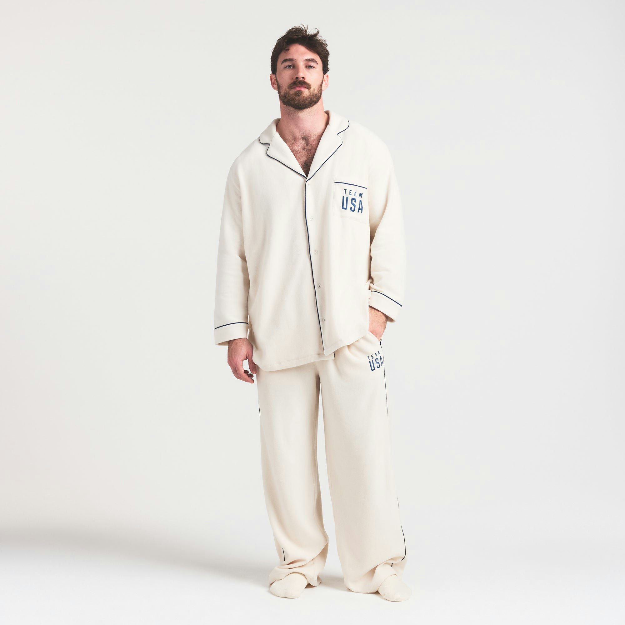 SKIMS FOR TEAM USA UNISEX FLEECE OLYMPIC OVERSIZED SLEEP TOP | ECRU ON A MODEL FRONT VIEW @ | FOCUS: 0.0, 1.0, 0.9