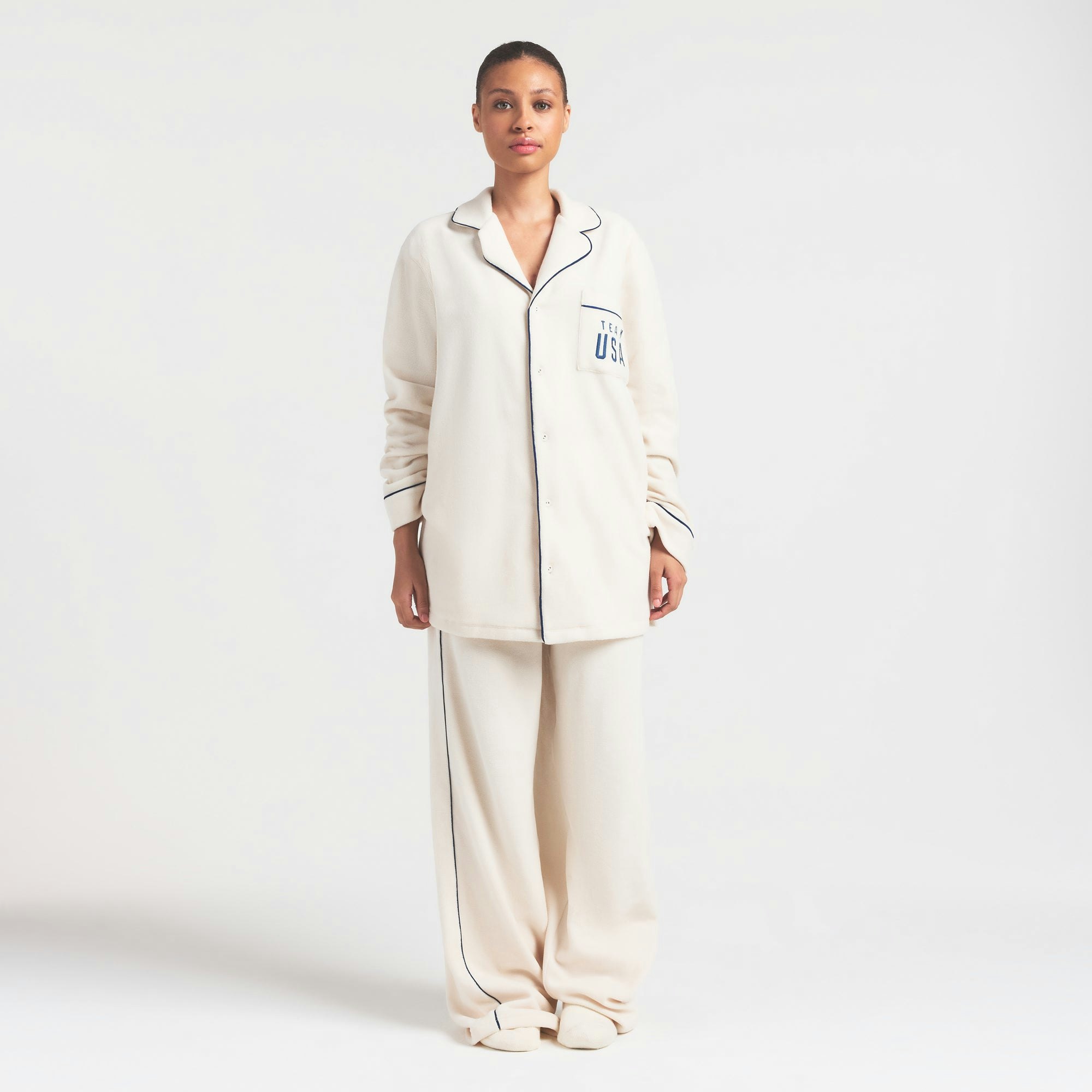 SKIMS FOR TEAM USA UNISEX FLEECE PARALYMPIC OVERSIZED SLEEP TOP | ECRU ON A MODEL FRONT VIEW @ | FOCUS: 0.0, 1.0, 0.9