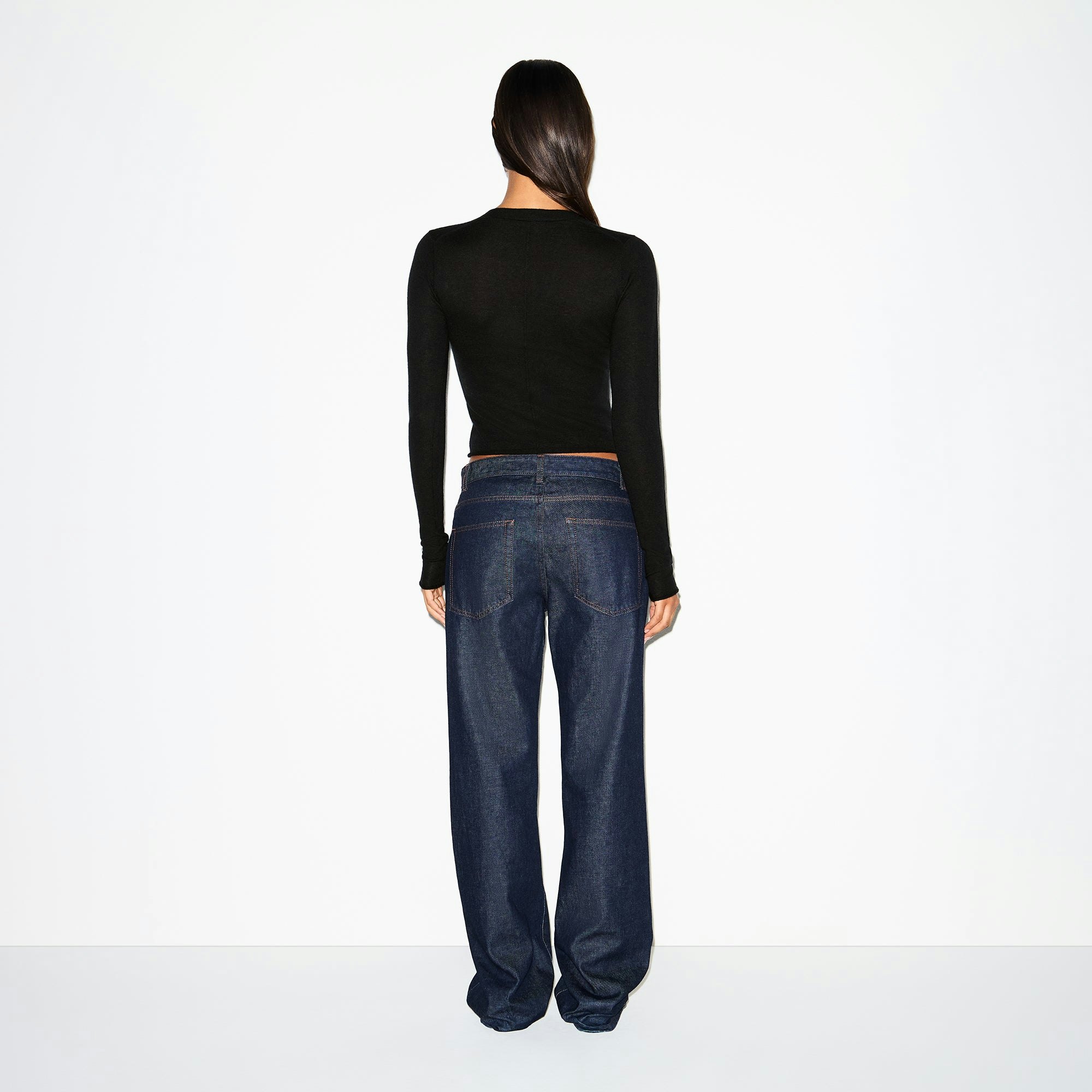 FEATHERWEIGHT CASHMERE CARDIGAN | ONYX ON A MODEL BACK VIEW @ | FOCUS: 0.0, 1.0, 0.9