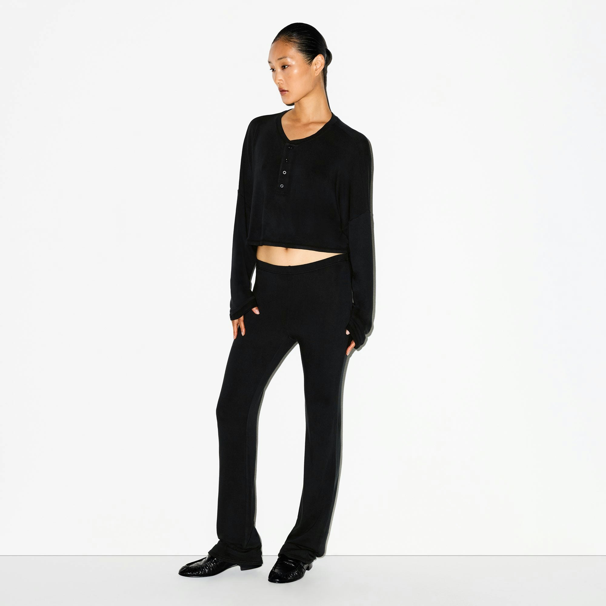LIGHTWEIGHT MODAL CROPPED HENLEY | ONYX ON A MODEL FRONT VIEW @ | FOCUS: 0.0, 1.0, 0.9