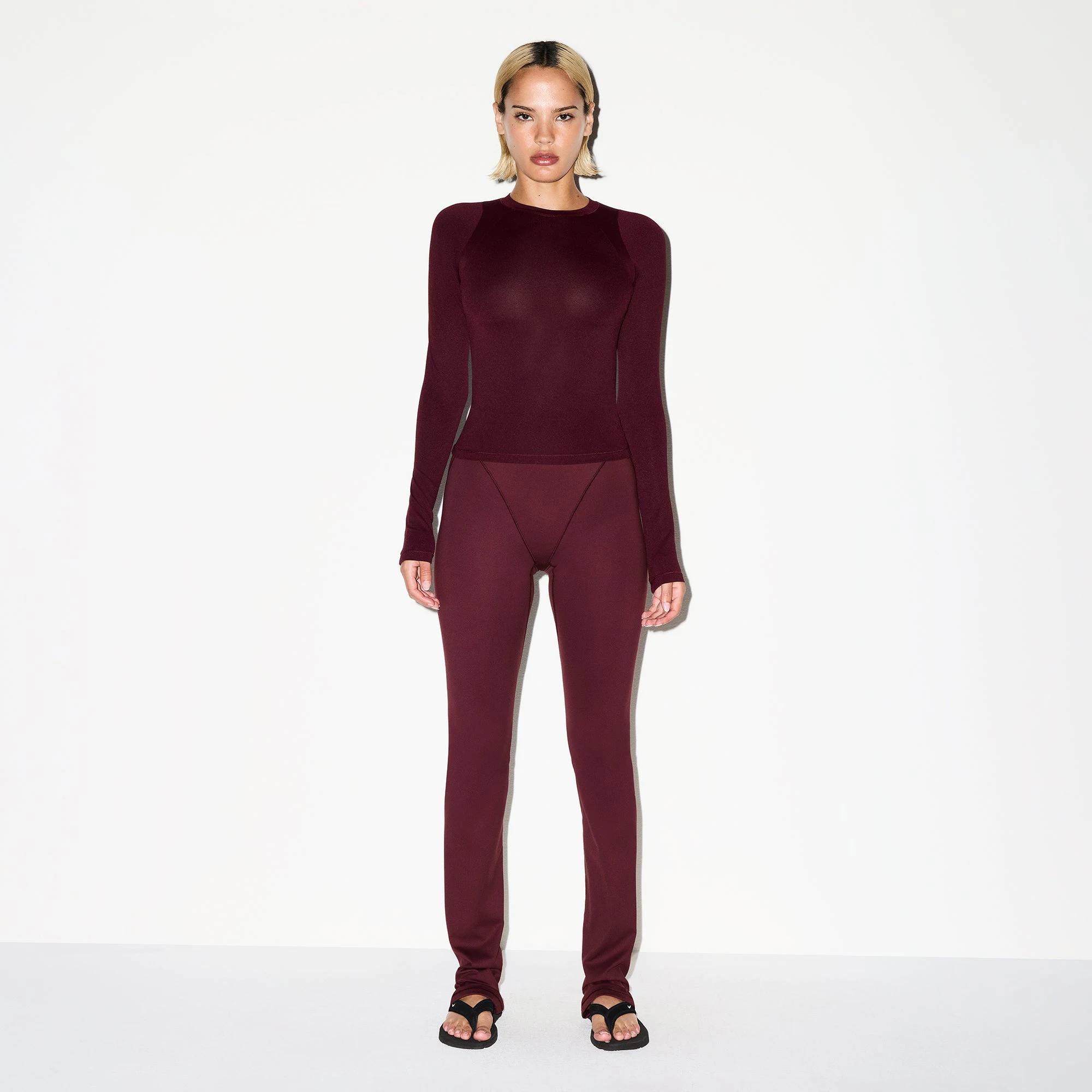 NikeSKIMS AIRY LONG SLEEVE CREW NECK TOP | CURRANT ON A MODEL FRONT VIEW @ | FOCUS: 0.0, 1.0, 0.9