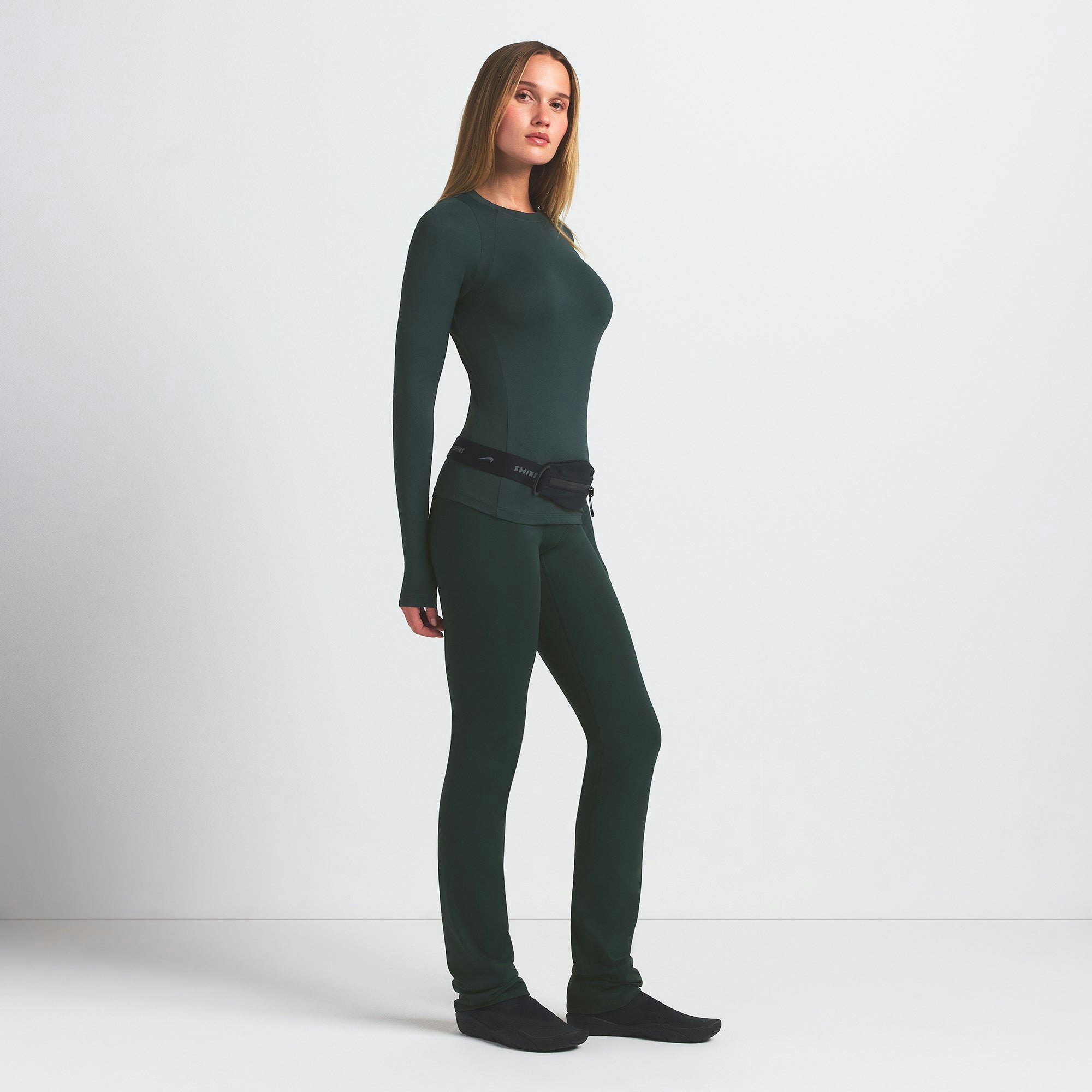 NikeSKIMS AIRY LONG SLEEVE CREW NECK TOP | DARK TEAL ON A MODEL FRONT VIEW @ | FOCUS: 0.0, 1.0, 0.9