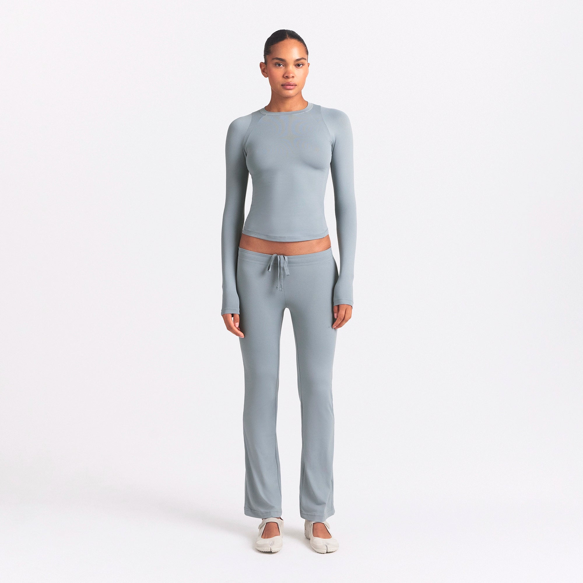 NikeSKIMS AIRY LONG SLEEVE CREW NECK TOP | WASHED PACIFIC ON A MODEL FRONT VIEW @ | FOCUS: 0.0, 1.0, 0.9