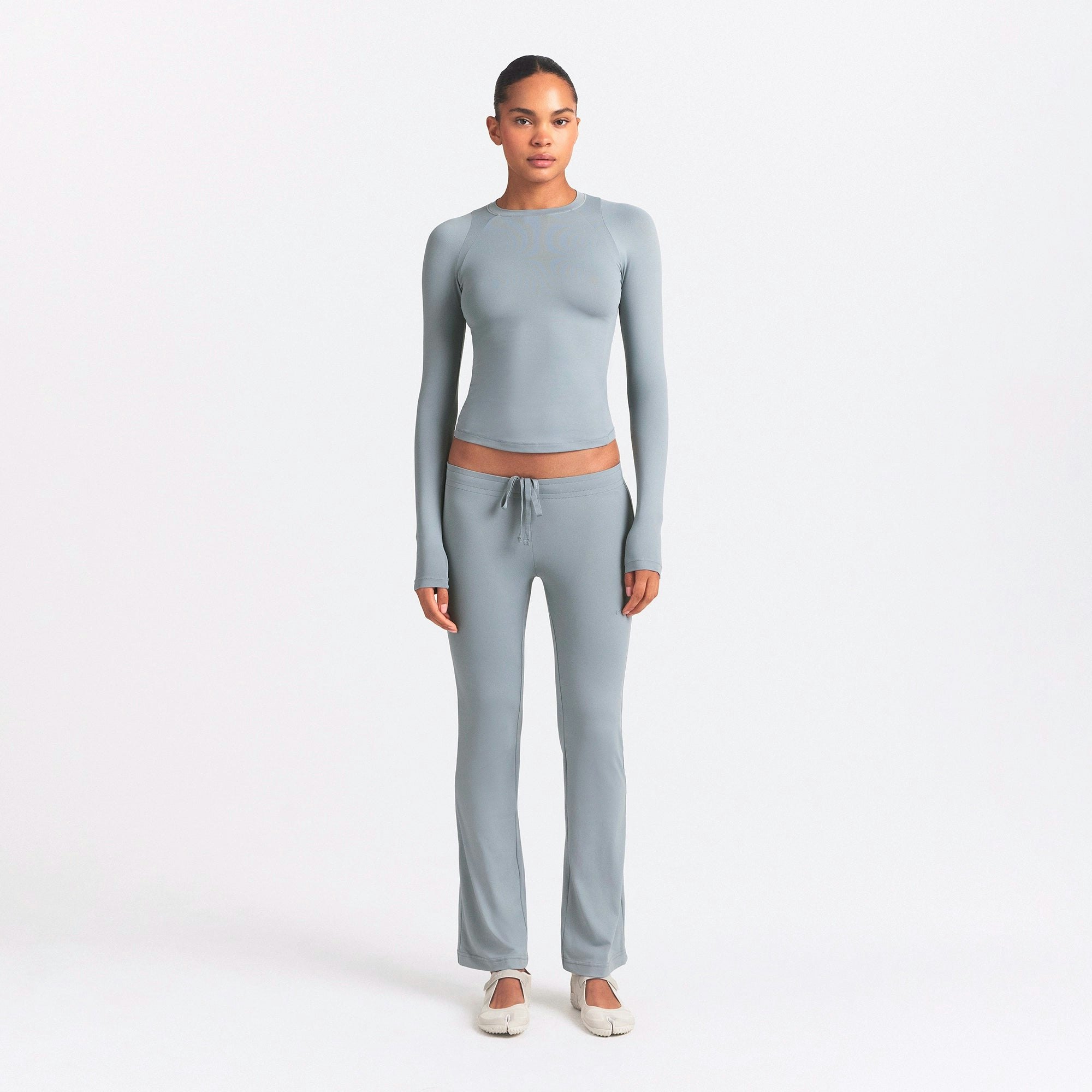 NikeSKIMS AIRY LONG SLEEVE CREW NECK TOP | WASHED PACIFIC ON A MODEL FRONT VIEW @ | FOCUS: 0.0, 1.0, 0.9
