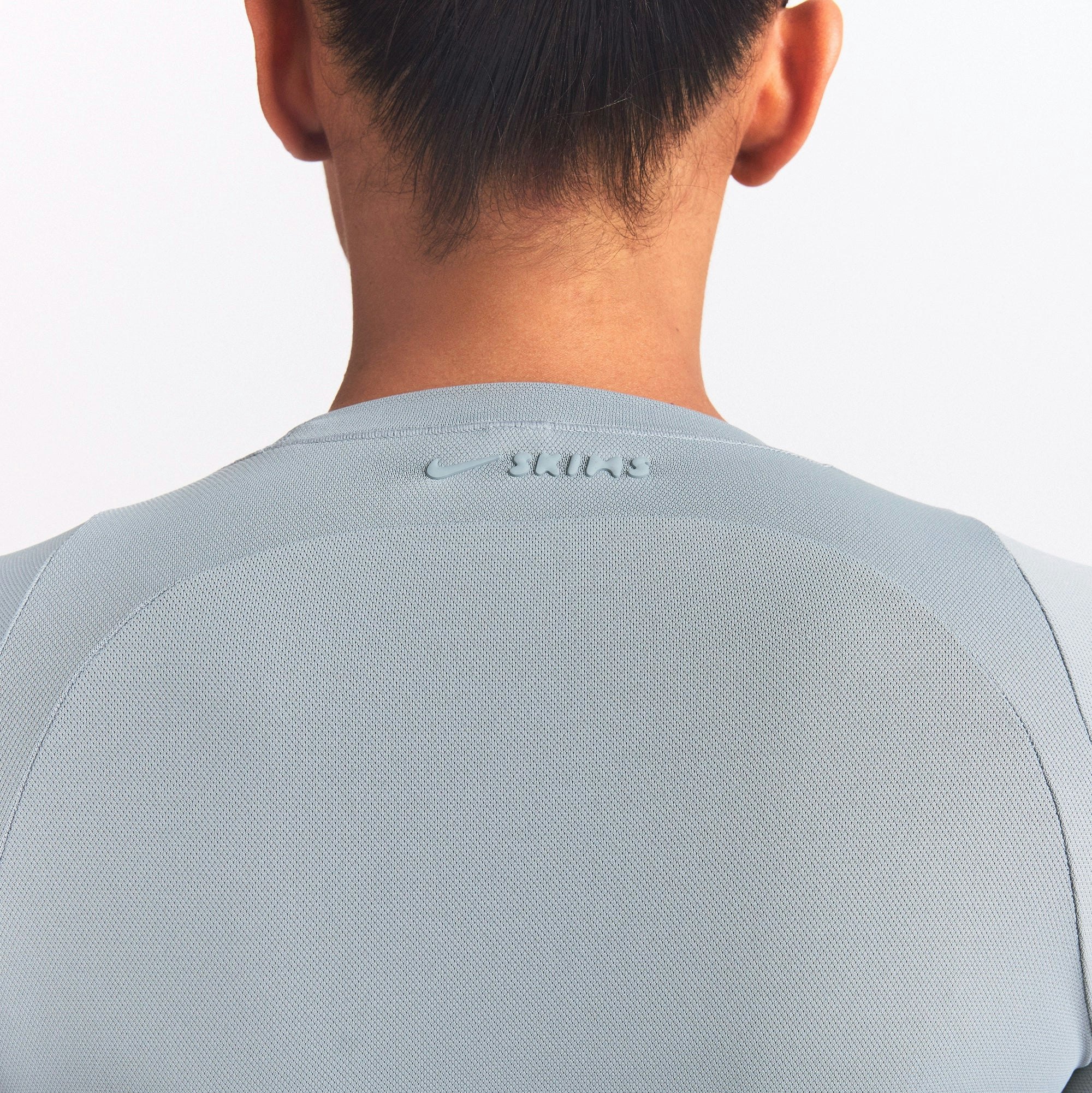 NikeSKIMS AIRY LONG SLEEVE CREW NECK TOP | WASHED PACIFIC ON A MODEL SIDE VIEW @ | FOCUS: 0.0, 1.0, 0.9