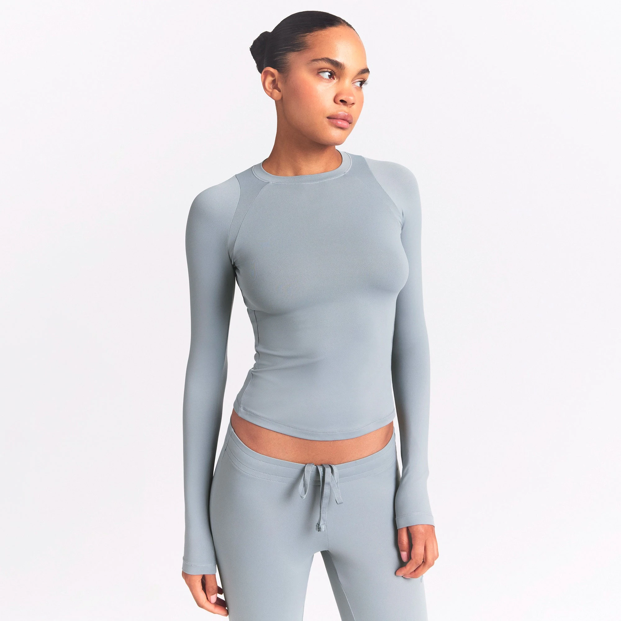 NikeSKIMS AIRY LONG SLEEVE CREW NECK TOP | WASHED PACIFIC ON A MODEL SIDE VIEW @ | FOCUS: 0.0, 1.0, 0.9