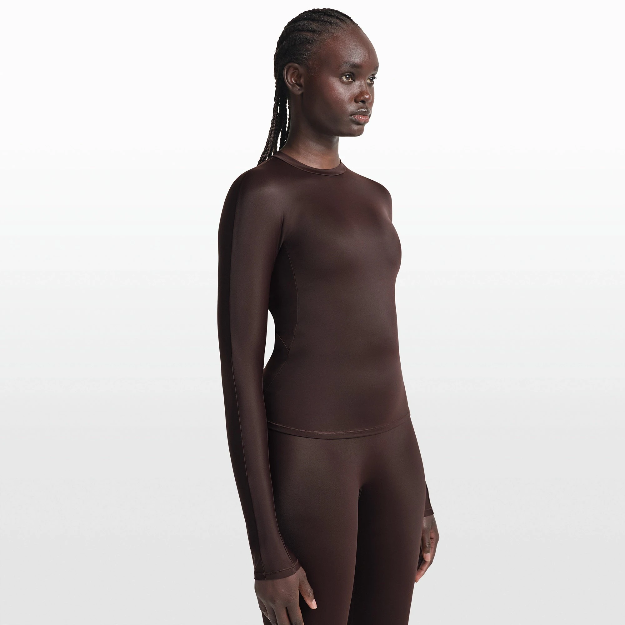 NikeSKIMS SHINE LONG SLEEVE CREW NECK TOP | PHOENIX ON A MODEL FRONT VIEW