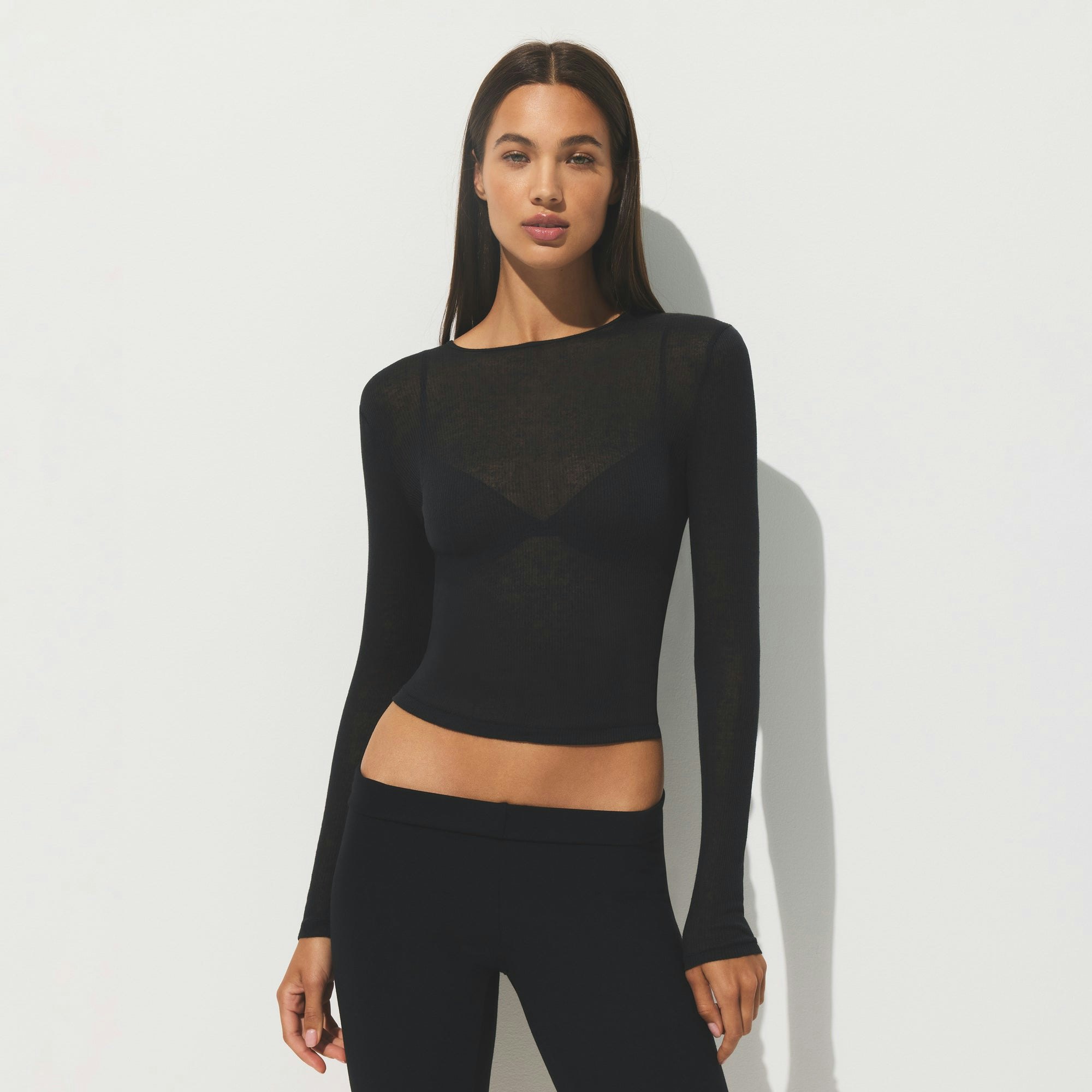 SHEER COTTON LONG SLEEVE T-SHIRT | SOOT ON A MODEL SIDE VIEW | FOCUS: 0.0, 1.0, 0.9