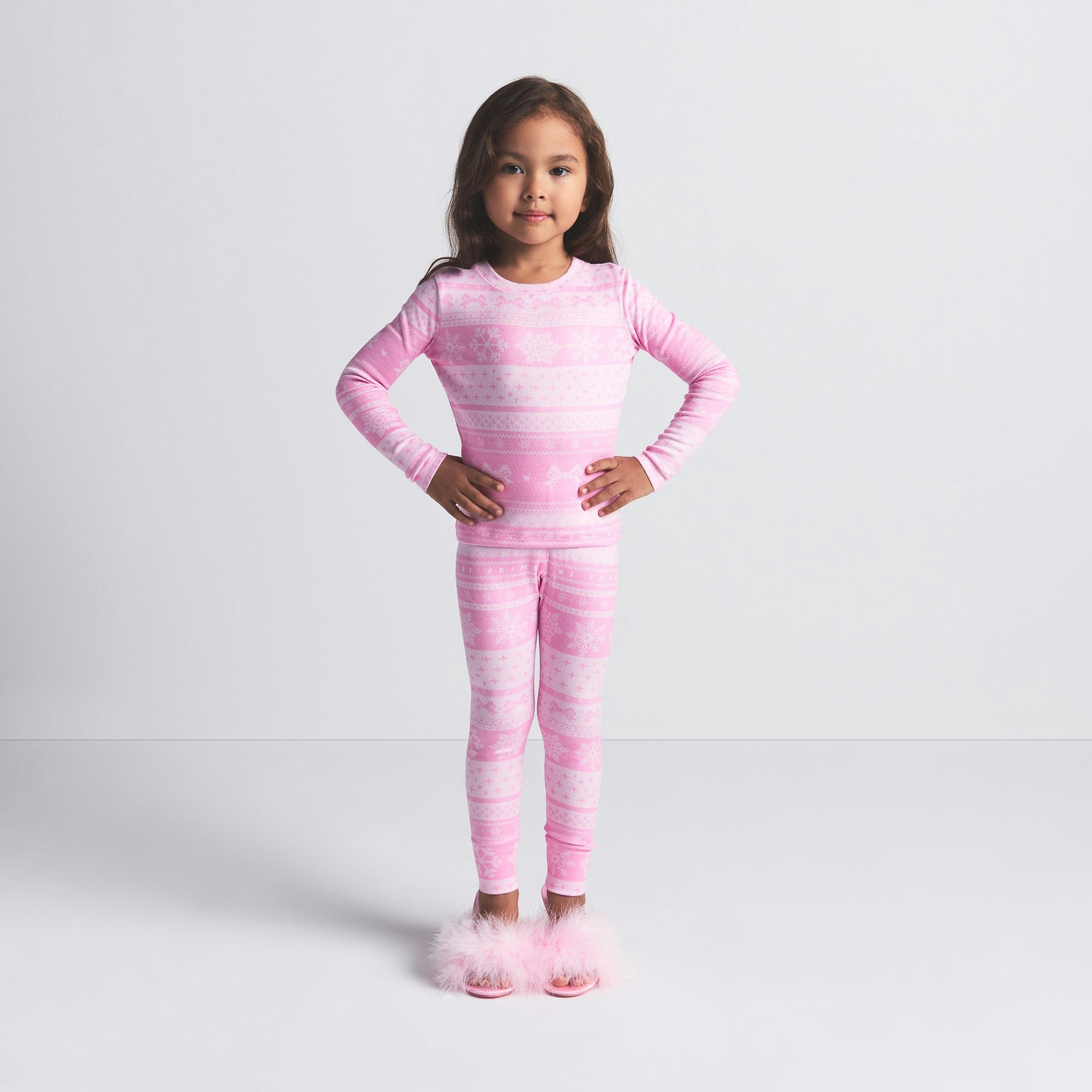 LOGO PLUSH POINTELLE KIDS LONG SLEEVE SET | BUBBLE GUM BOW FAIR ISLE ON A MODEL FRONT VIEW