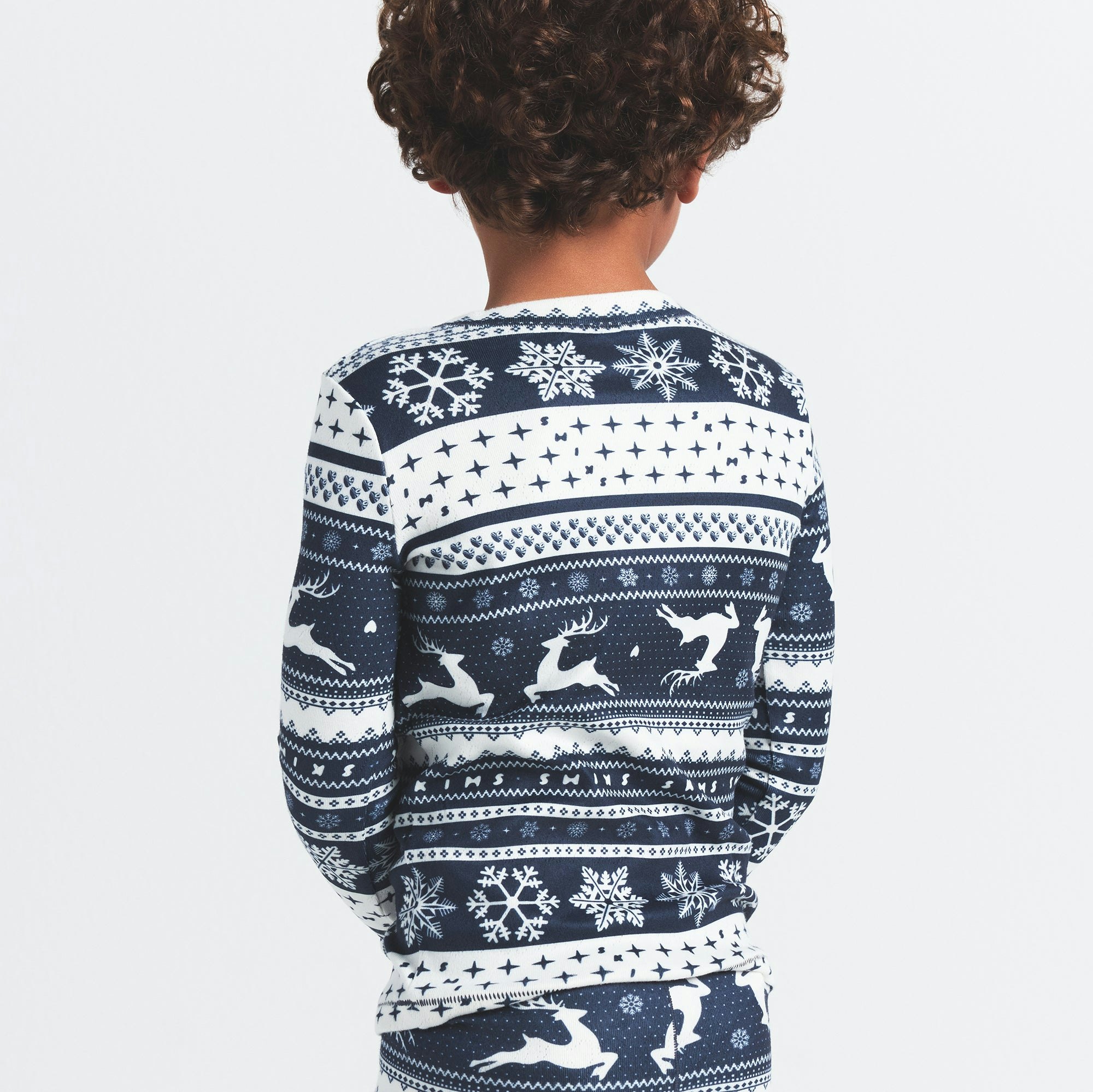 LOGO PLUSH POINTELLE KIDS LONG SLEEVE SET | NAVY DEER FAIR ISLE ON A MODEL BACK VIEW