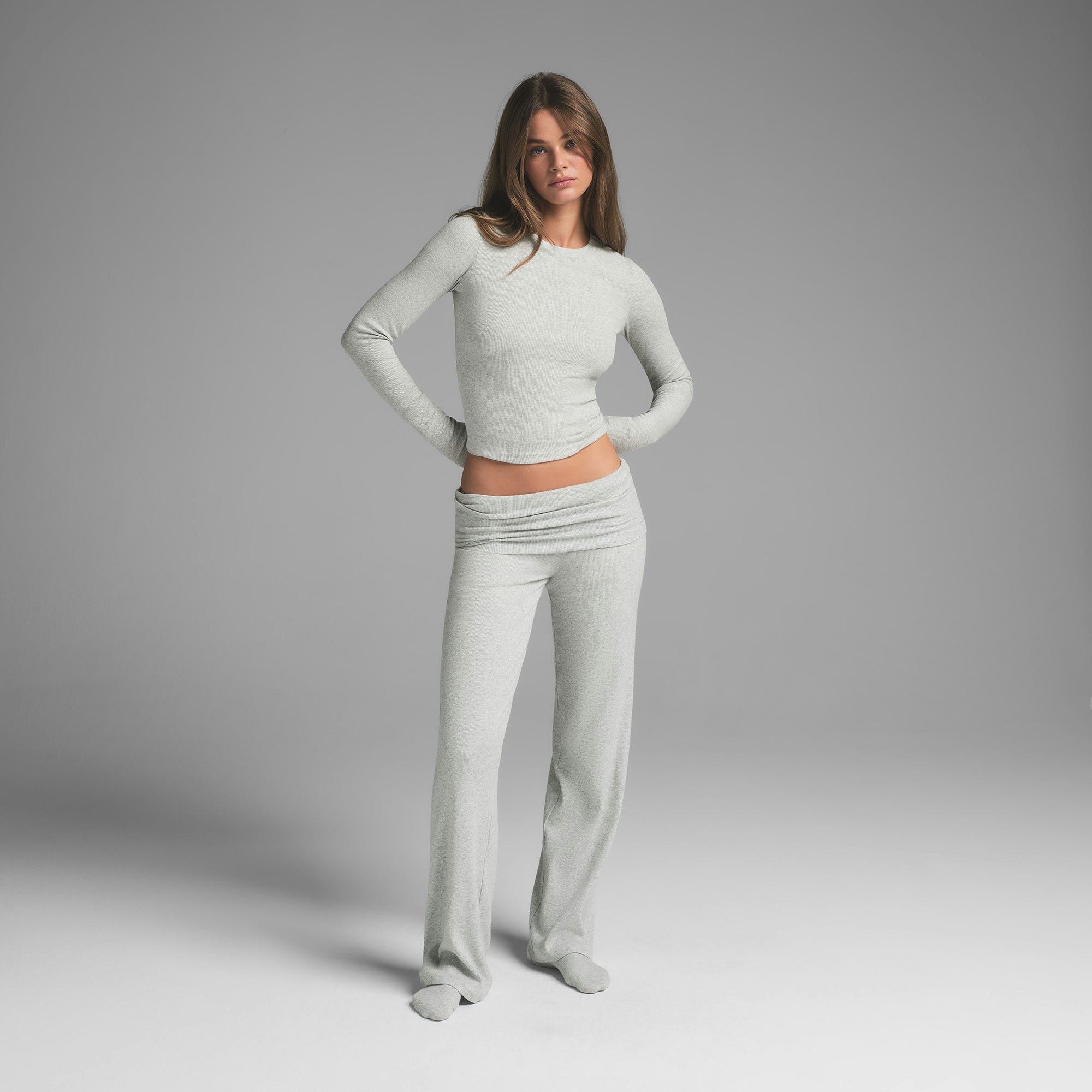 COTTON RIB LONG SLEEVE T-SHIRT | LIGHT HEATHER GREY ON A MODEL FRONT VIEW  | FOCUS: 0.9, 0.1, 0.7